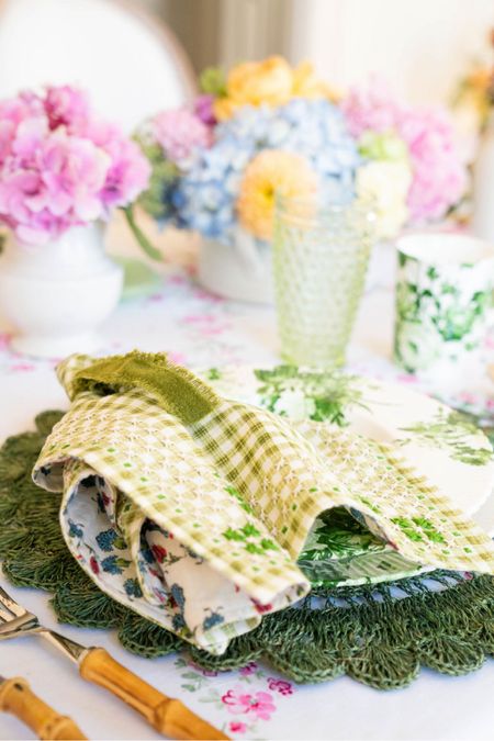 Fresh like Spring! this green and white table will be the one you set again and gain during your warm weather get together. This country inspired table is filled with florals and beautiful textures. 
These  plates are some  of Anthropologies best sellers and they’ll be your favorites too!
#springtable #springtablescapes #greensndwhitetable #countrydecor
#gighamnapkins #hobnailglasses 
#casualenterternaining


#LTKMostLoved #LTKhome #LTKSeasonal