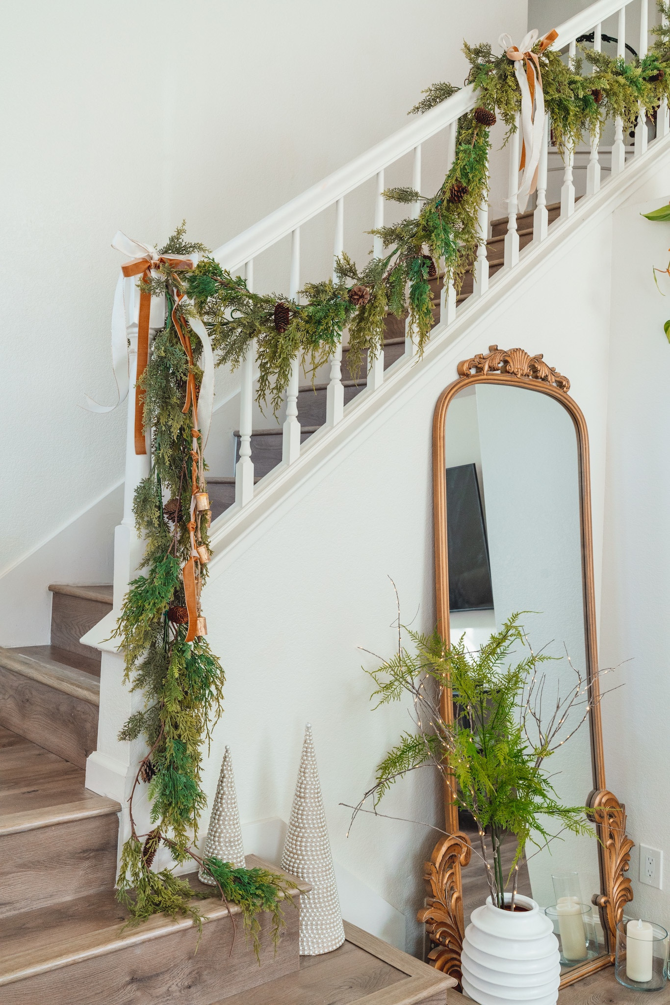 Christmas banister decoration with cypress pine garland 

#LTKHoliday #LTKhome #LTKsalealert