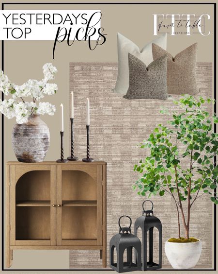 Yesterday’s Top Picks. Follow @farmtotablecreations on Instagram for more inspiration.

Loloi Performance Sand Area Rug. Nathan James Wood Accent Modern Free Standing Buffet Sideboard. Artisan Handcrafted Terracotta Vases. Cherry Blossom Branch. Easton Forged-Iron Taper Candleholder. 72" Artificial Ficus Tree - Threshold designed with Studio McGee. Serene Pillow Cover Set. Cast Aluminum Outdoor Lantern Candle Holder Black - Threshold. 

#LTKHome #LTKSaleAlert #LTKFindsUnder50
