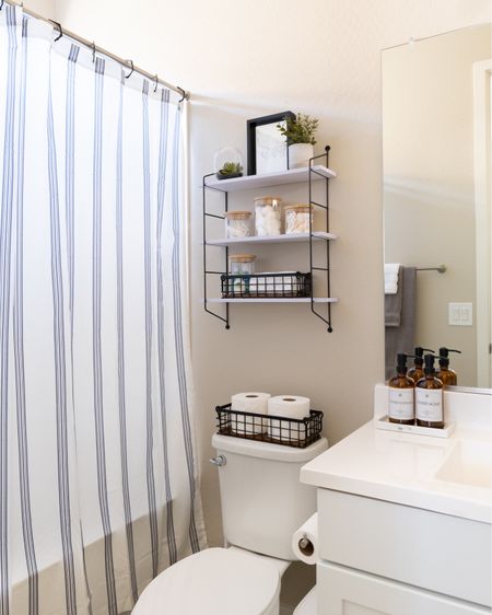 Guest bathroom makeover with @wayfair essentials, just in time to host friends and family. Shower curtain, glass containers, metal baskets and soap dispensers. #wayfair #noplacelikeit #wayfairfinds

#LTKhome #LTKsalealert #LTKHoliday