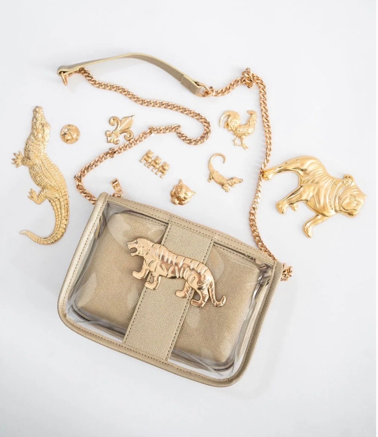I'm all for making a clear purse cute this one is perfect and you can switch the gold mascot there's so many options!

#LTKSeasonal #LTKootd