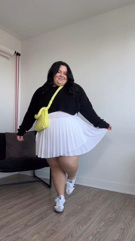 Plus size tennis skirt outfit 
Plus size tennis dress from aerie wearing a size XL
woven bag from aerie, but sold out so similar one linked below. 
Black cropped sweater from Pretty little thing wearing a size 2X/18 
Adidas Samda shoes 

#LTKPlusSize #LTKMidsize #LTKFindsUnder50