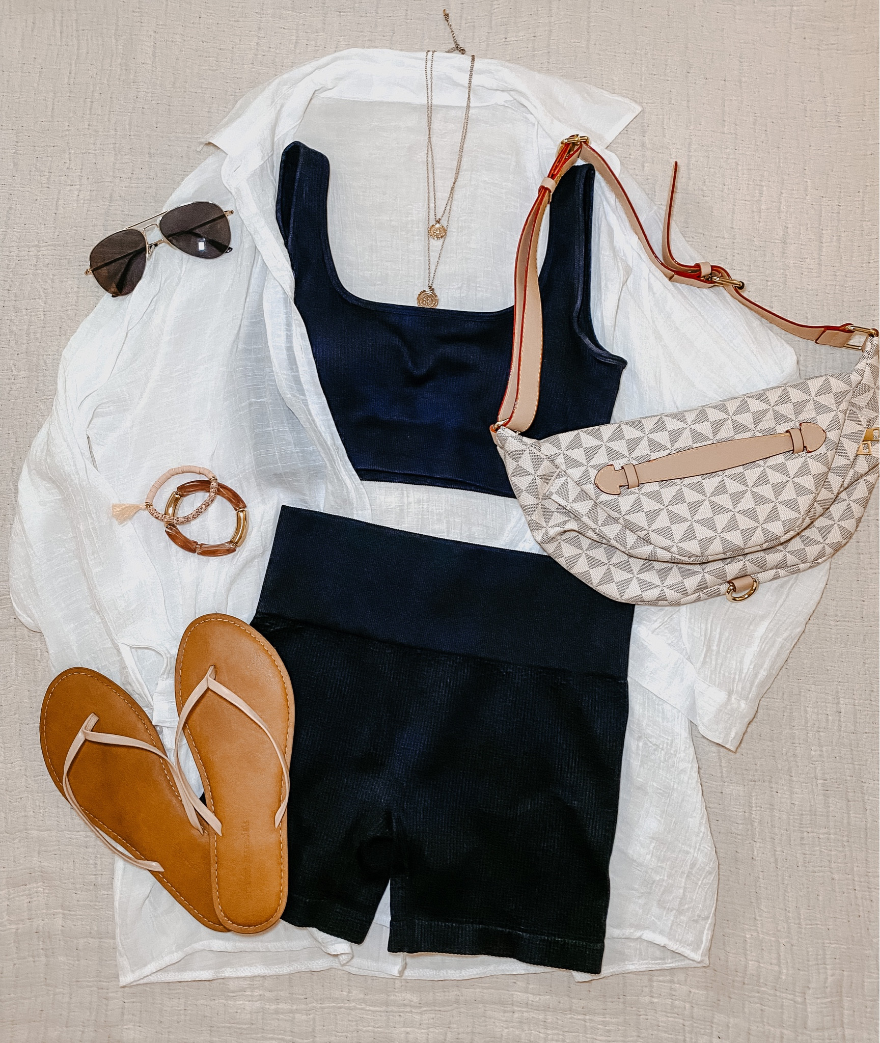 Ribbed set. Workout set. Matching set. Black set. Biker short set. Biker shorts. Sports bra. Black sports bra. Belt bag. Checkered belt bag. Checkered bag. White button down. Gauzy shirt. Button down shirt. 

#LTKSeasonal #LTKstyletip #LTKunder50