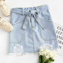 Dual Pocket Tie Waist Raw Hem Denim Skirt | SHEIN