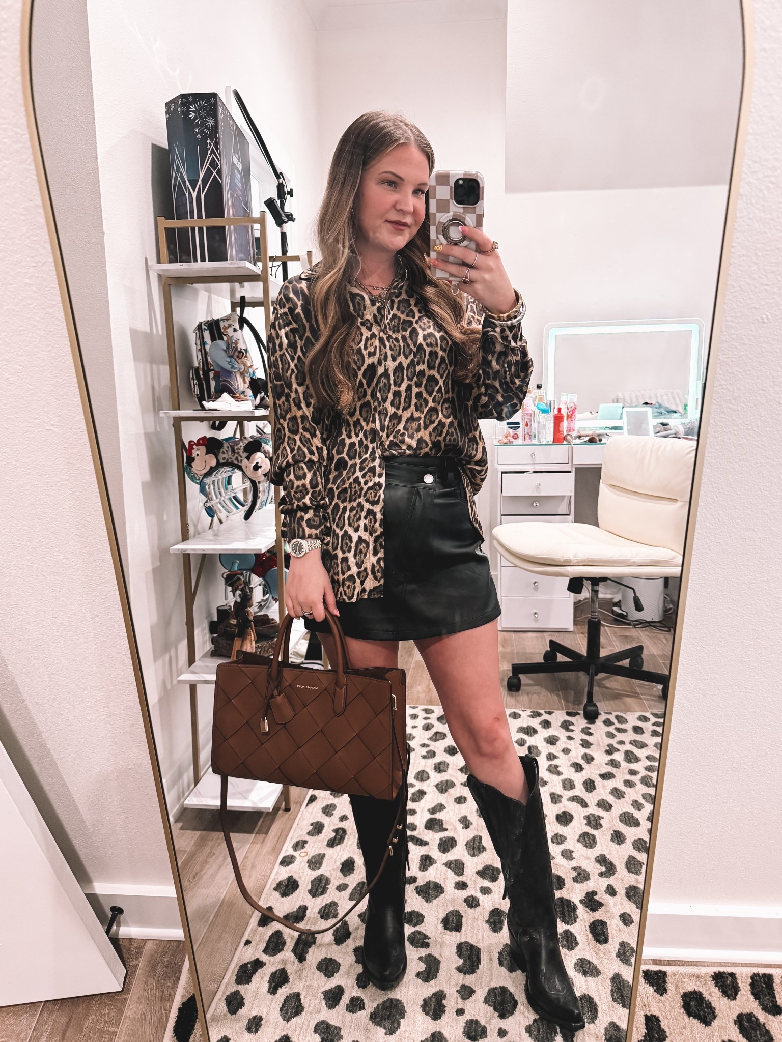 Wild side, but make it classy
This Berenice leopard top paired with a Revolve skort is the perfect combo of bold and sleek. Styled it with my black Ariat Casanova boots and a structured Michael Kors bag for a polished touch. 

#LTKPetite #LTKStyleTip