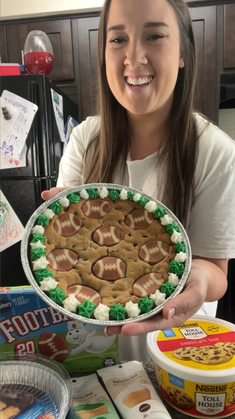 Let’s make the viral Football Cookie Cake! 🏈🍪 It’s sure to be a crowd pleaser! You can pickup all the supplies up at Target 🎯 

Fill the bottom of the tin with a layer of cookie dough. Then place the football cookies on top. Bake according to package directions. Let it cool completely and add icing.

#LTKFamily #LTKHome #LTKSeasonal
