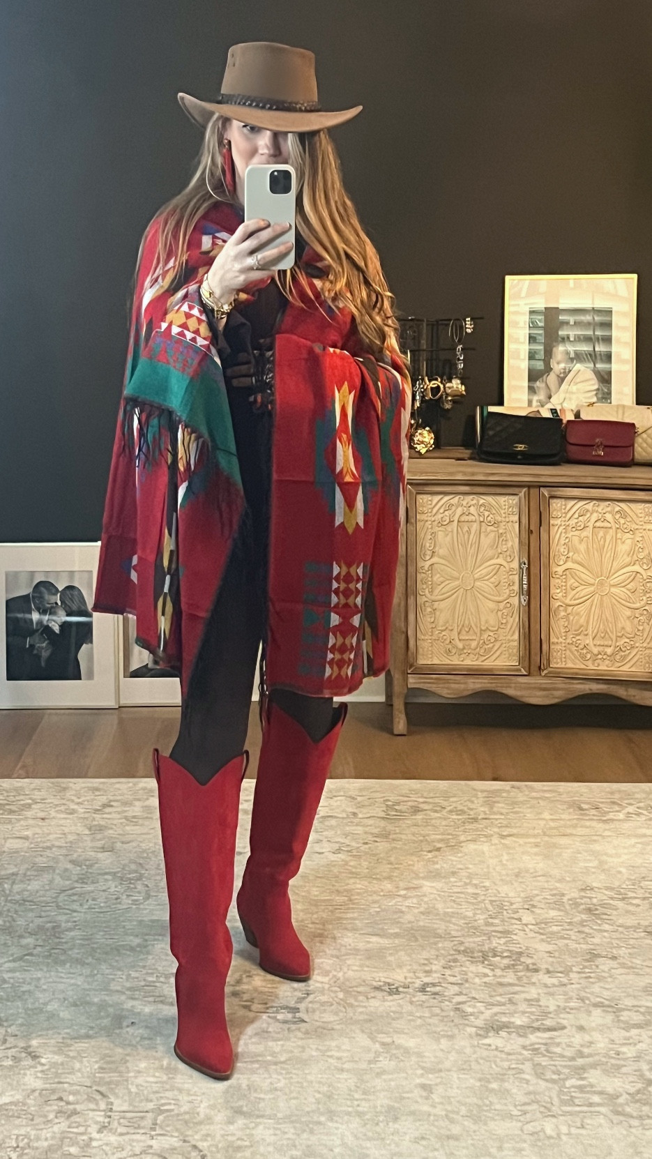 Red Hot ❤️❤️❤️ yall. I got these red cowgirl boots slightly as a joke and now am OBSESSED with them. Paired with my favorite chocolate brown top and leggings and a fun Aztec-inspired poncho. I am already planning *so* many fun ways to wear these! If you’re considering getting yourself a pair — do it  