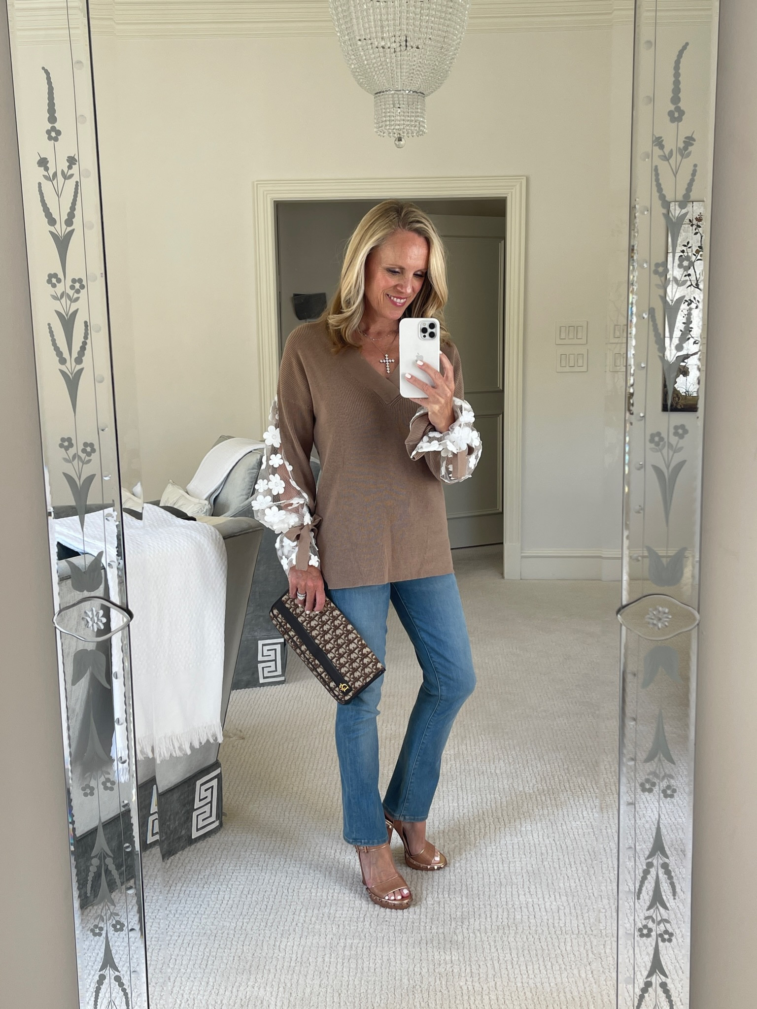 Favorite fall sweater is now on sale!
Camel Vneck  sweater with lace sleeves
French connection sweater
Light wash Mother denim

#LTKSeasonal #LTKunder100 #LTKsalealert