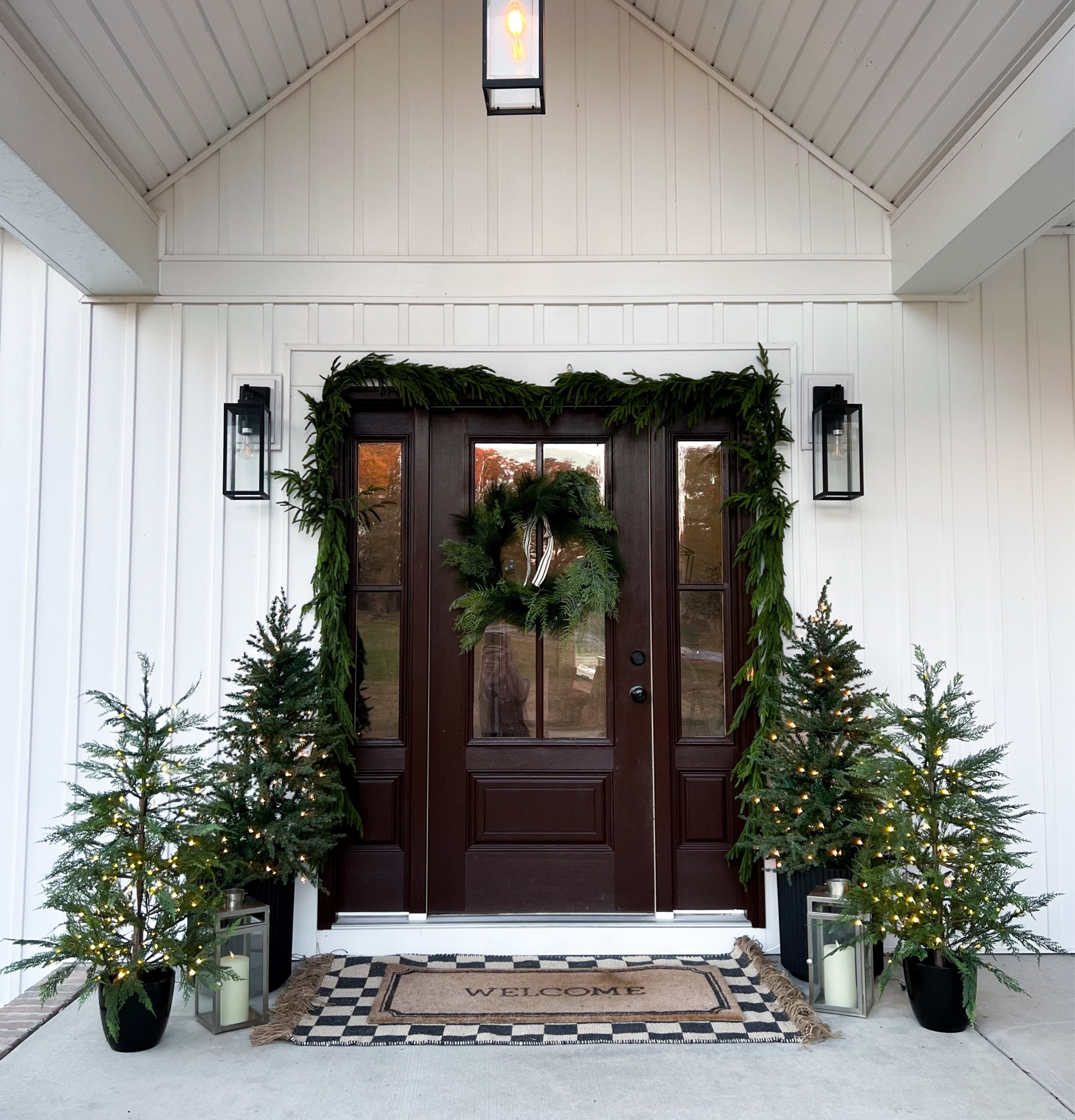 Here’s this year’s Christmas front porch!

Front porch Christmas trees
Potted Christmas trees
Checkered layering rug
Welcome mat
Christmas wreath SaleSale

#LTKSeasonal #LTKHoliday #LTKHolidaySale
