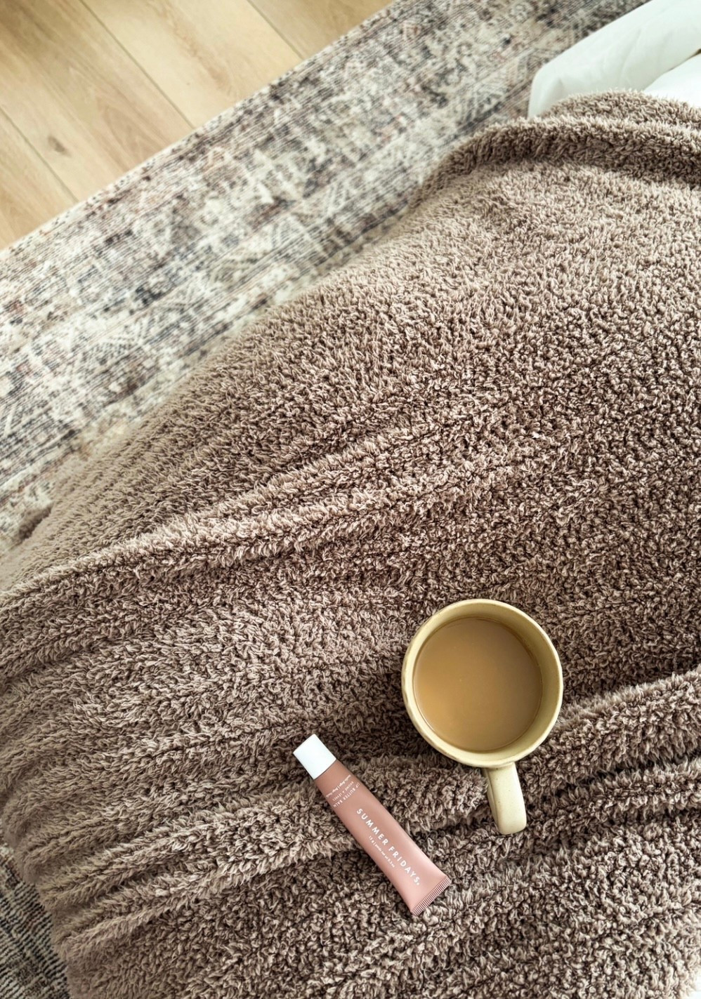 Slow mornings. ☁️☕️🤎 Cozy plush blanket from Simply Organic Bamboo, hydrating @Summer Fridays lip balm, and freshly brewed hot coffee. 

#LTKmorningroutine #LTKBeauty #LTKHome