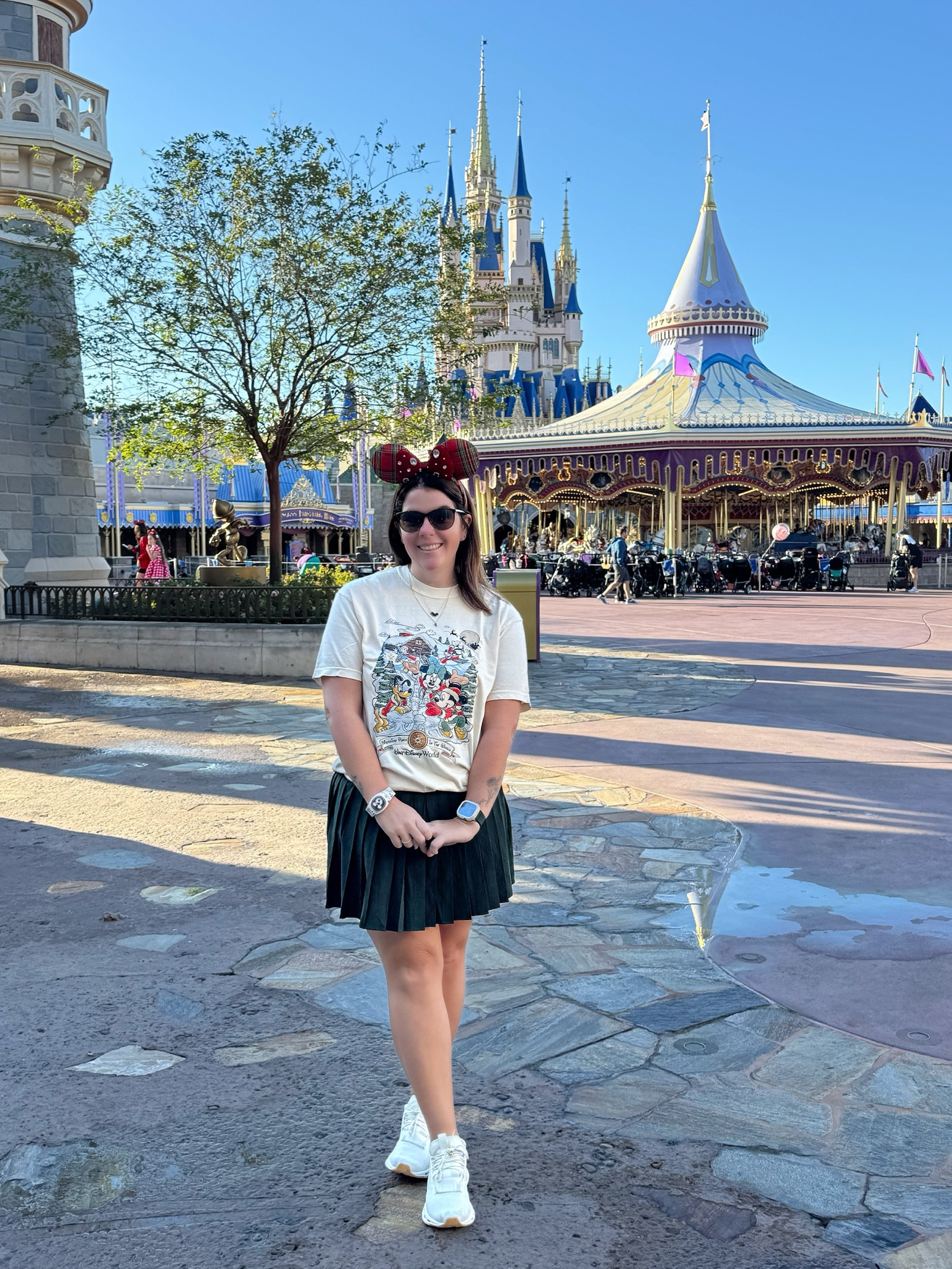 A Disney Holiday OOTD! I found this cute Disney Holiday tee on Etsy and it was a win for a day at Magic Kingdom! I paired the tee with this gorgeous, green athletic skirt from Lululemon! Everything runs TTS and I will link everything! 

#LTKStyleTip #LTKTravel #LTKHoliday