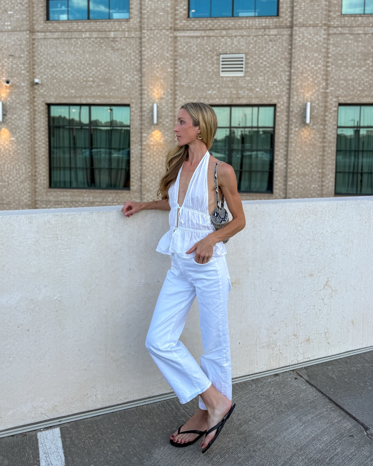 Late summer date night outfit! White halter is old (similar linked), MOTHER jeans size 25 (so comfortable and a bit of stretch), sandals TTS, bag is old (similar linked).

summer night out, white cropped jeans, white wide leg jeans, snakeskin bag, snakeskin purse, fall purse, white blouse, summer to fall outfits

#LTKgrwm #LTKSeasonal #LTKootd