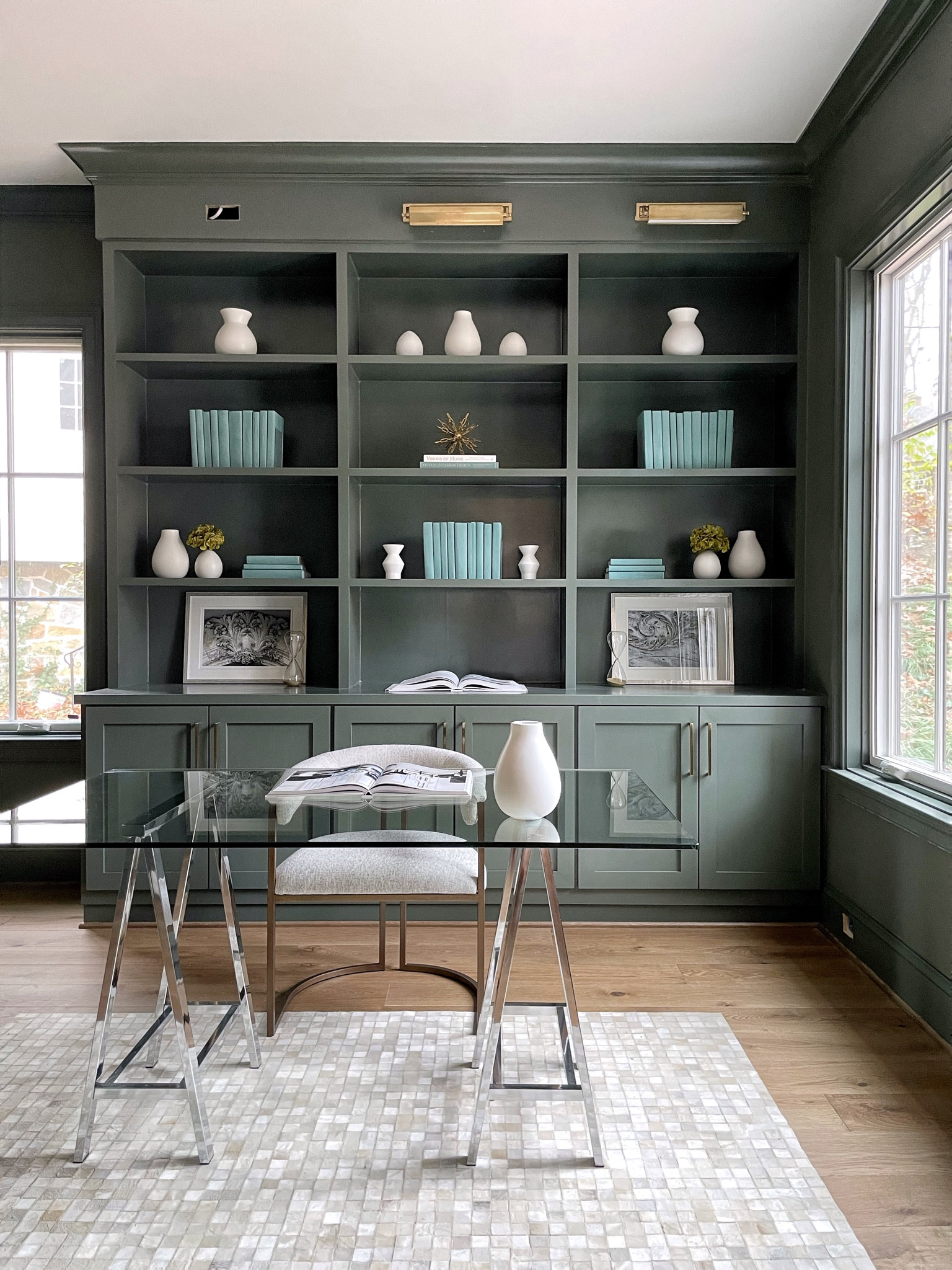 The home office is ever changing but adding luxury home decor will always add some spice ✨ This office is full of luxury furniture and vases with a desk made of glass. A room of pure sophistication! #luxuryhomeoffice #homeoffice #officeinspiration

#LTKFind #LTKfamily #LTKhome