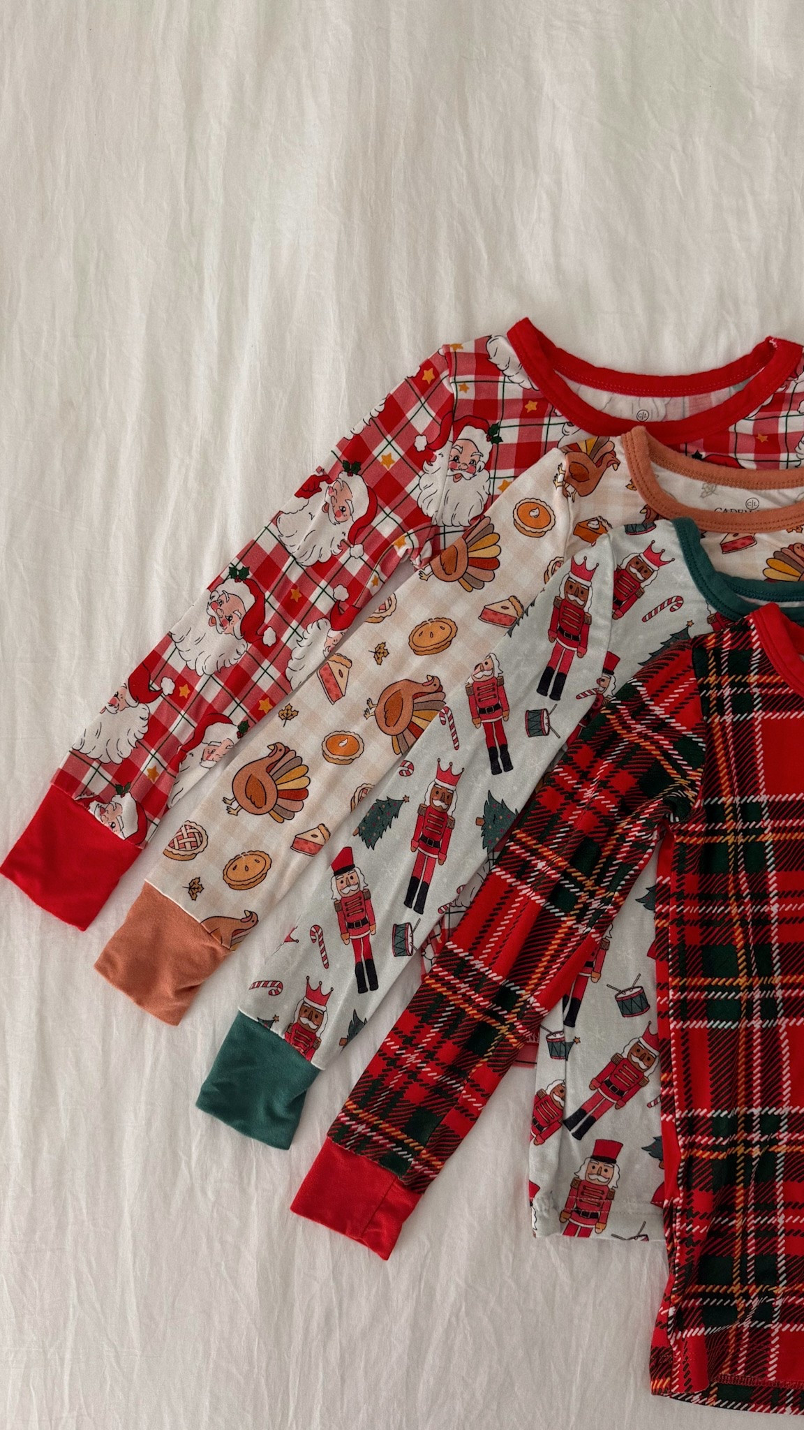 New from Caden Lane! I get bub a size 3T, they’re a little big but 2T is too snug 🫶🏼 the cutest toddler & baby holiday pajamas! #toddler #familypajamas #chrisaspajamas #cadenlane #matchingpajamas @Caden Lane 

Code LRESSLER gets your 20% off through Sept 30! 

We did our family pajamas in the red plaid so we will all match too!

#LTKmomlife #LTKSeasonal #LTKSaleAlert