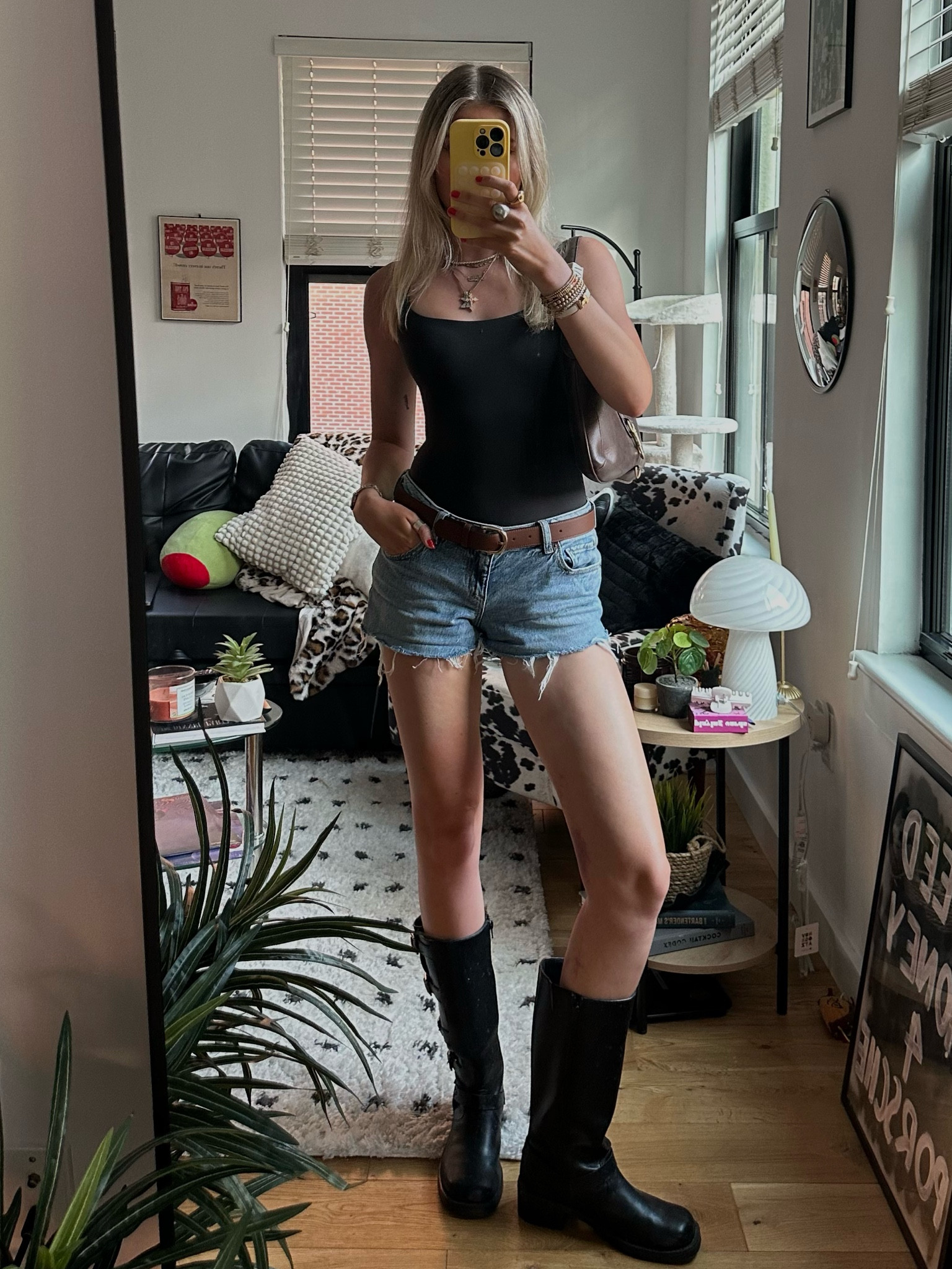 bodysuit: size xxs 
shorts: diy cut jeans😭
belt: thrifted 