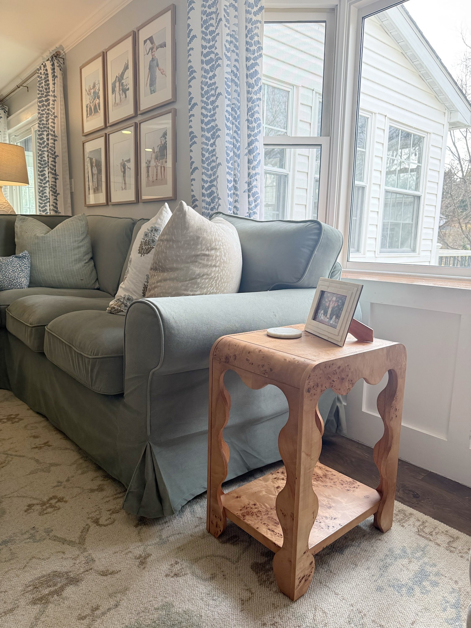 My burlwood side table is back in stock!  

My green sectional is the Uppland by ikea.  Everything else is linked here 