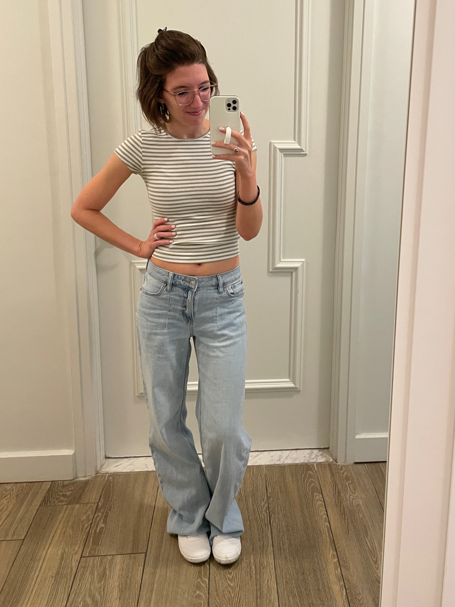 #HotelSelfieMirrorGameStrong 💪🏻 
Tee: TTS
jeans: size down, wearing the regular length. They have a raw hem, so they can be cut down
Sneakers: TTS

Travel outfit | vacation outfit | airplane outfit | wide legs jeans | 90s jeans | low rise jeans | white sneakers | baby tee 

#LTKTravel #LTKBacktoSchool #LTKSaleAlert