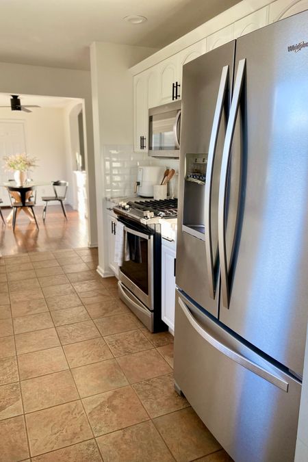 French door refrigerator with front water and ice dispensers. 

Our old refrigerator recently gave out, thankfully, The Home Depot was having a big sale on all of their top brand French door refrigerators.

We were able to purchase 2 refrigerators for the price of one. 

#LTKhome #LTKsalealert