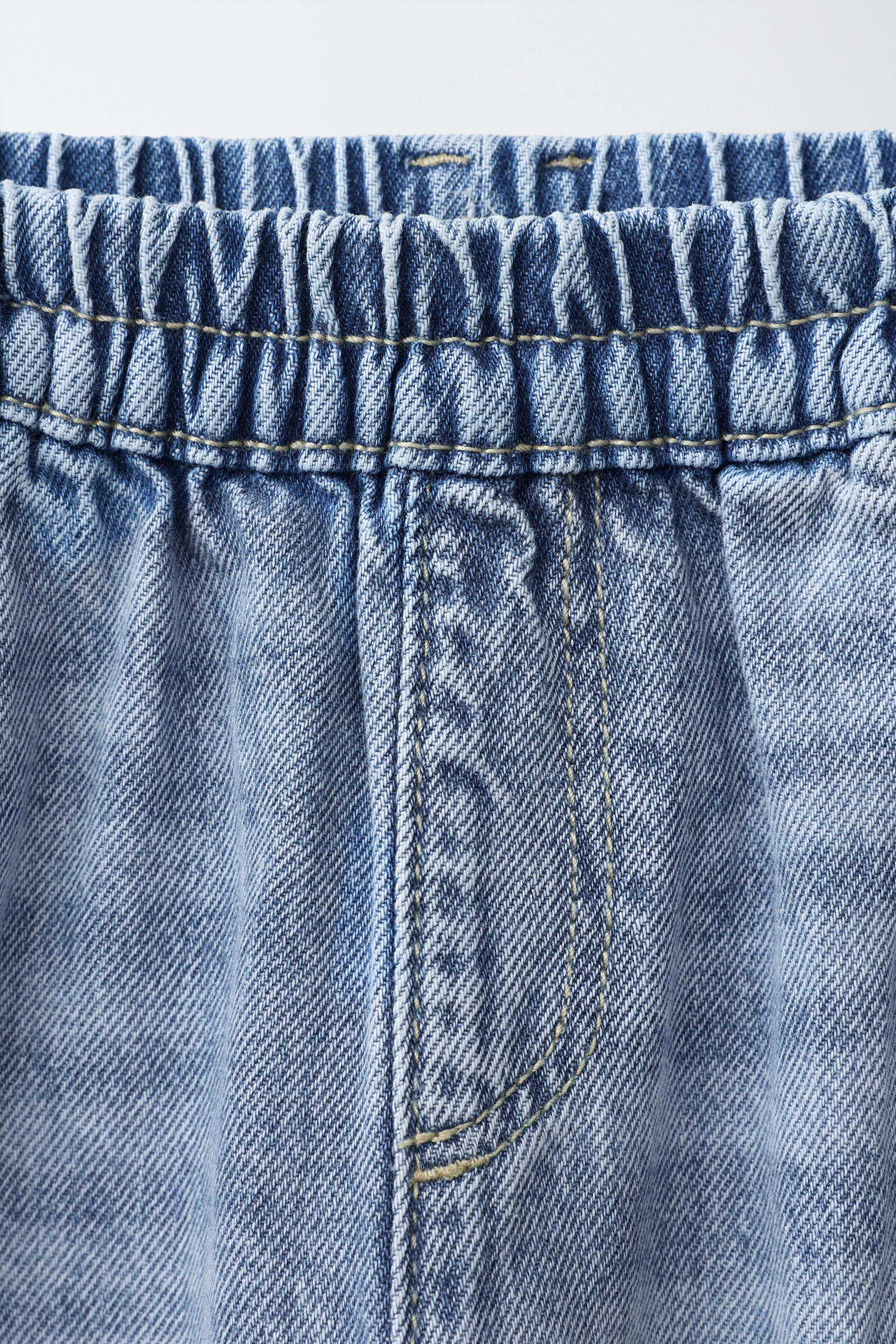 Balloon cargo jeans with an elastic waistband. Features front pockets, back patch pockets, and si... | Zara US