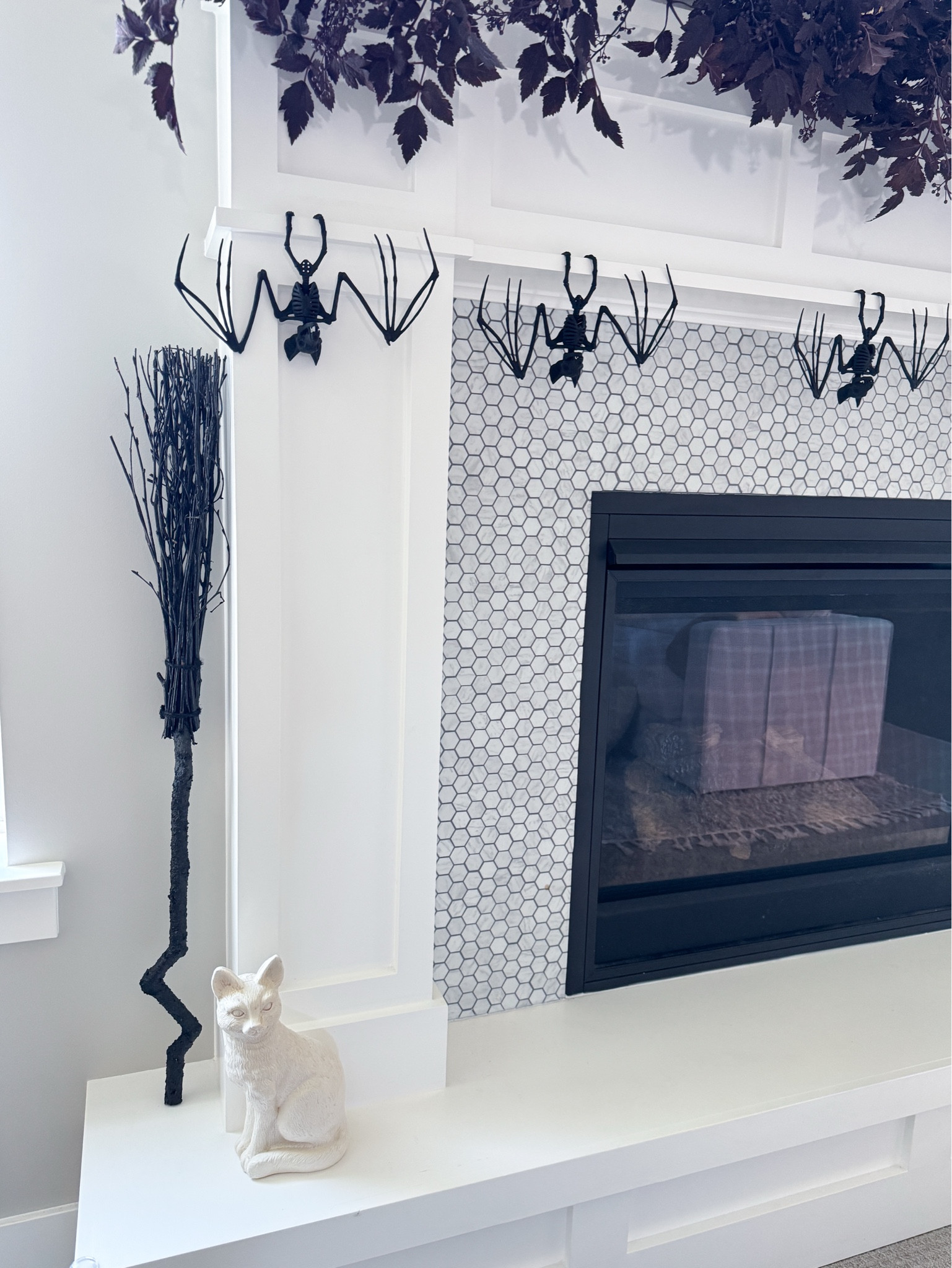 Simple, neutral mantel Halloween Decorations 

Neutral Decor - Witches Broom - Black Bats - Dark Leaf Garland 

#LTKHome #LTKSeasonal #LTKHalloween