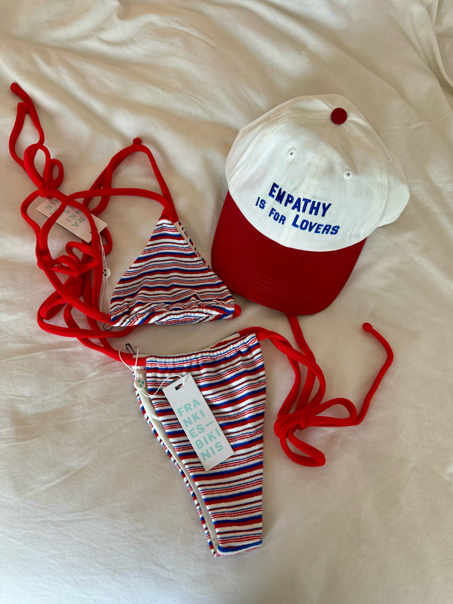 The perfect “All American” beach/pool day fit 👙🧢

#LTKSwim #LTKSummerSales