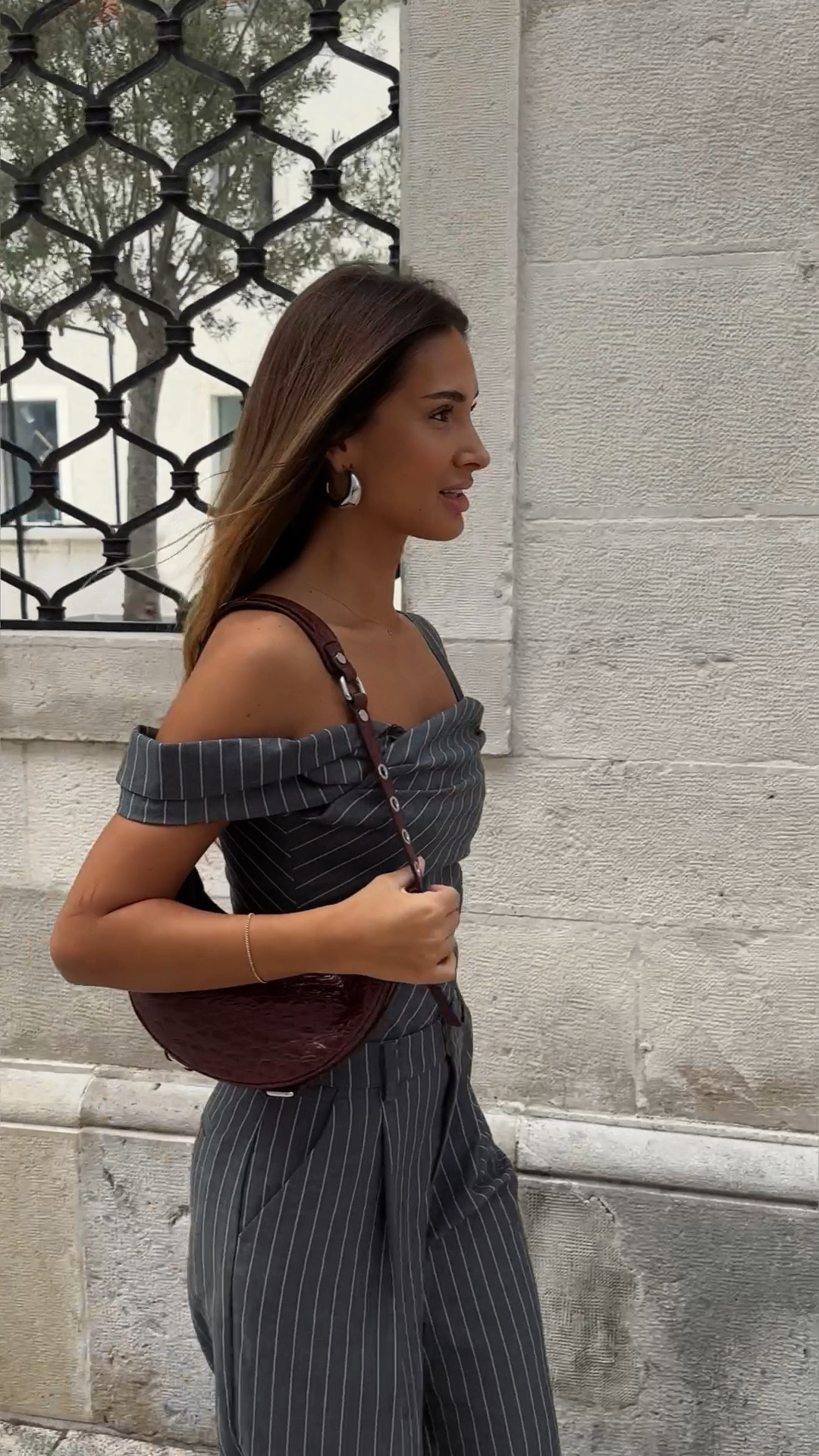 Revolve gray suit matching top and pants, brand is house of harlow and bag is by far. I’m wearing size S