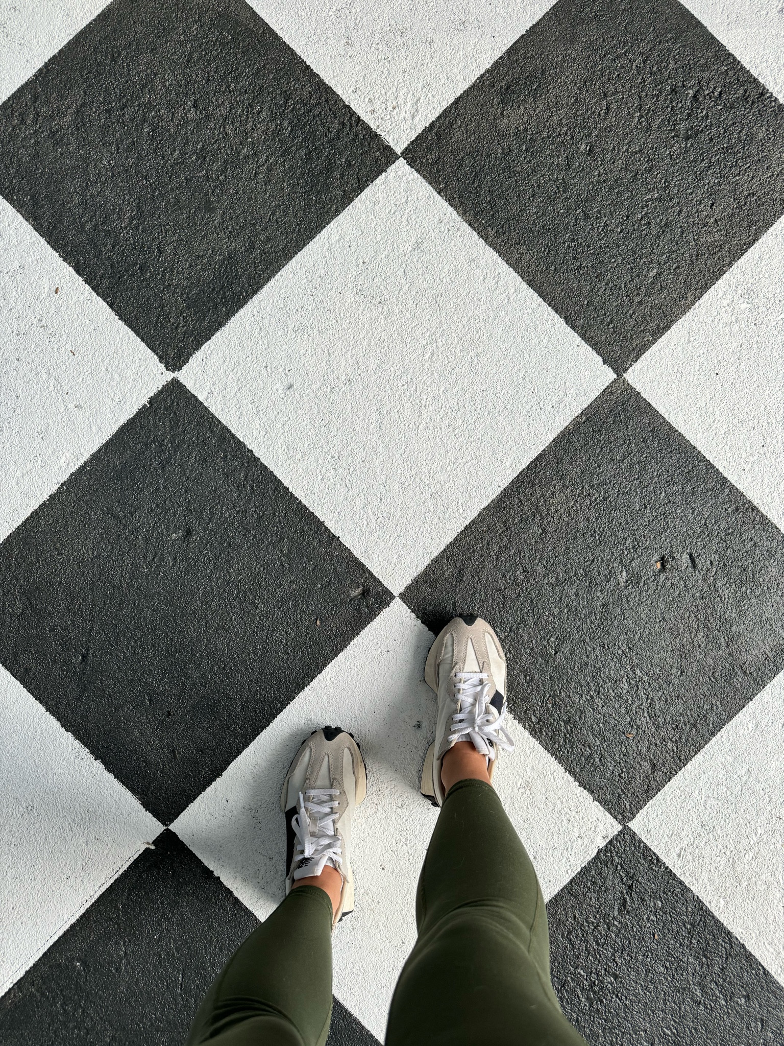 White- Valspar Du Jour
Black- Valspar Caviar 

DIY painted patio
Checkerboard floors
Classic
Painted concrete 

#LTKHome #LTKFindsUnder50