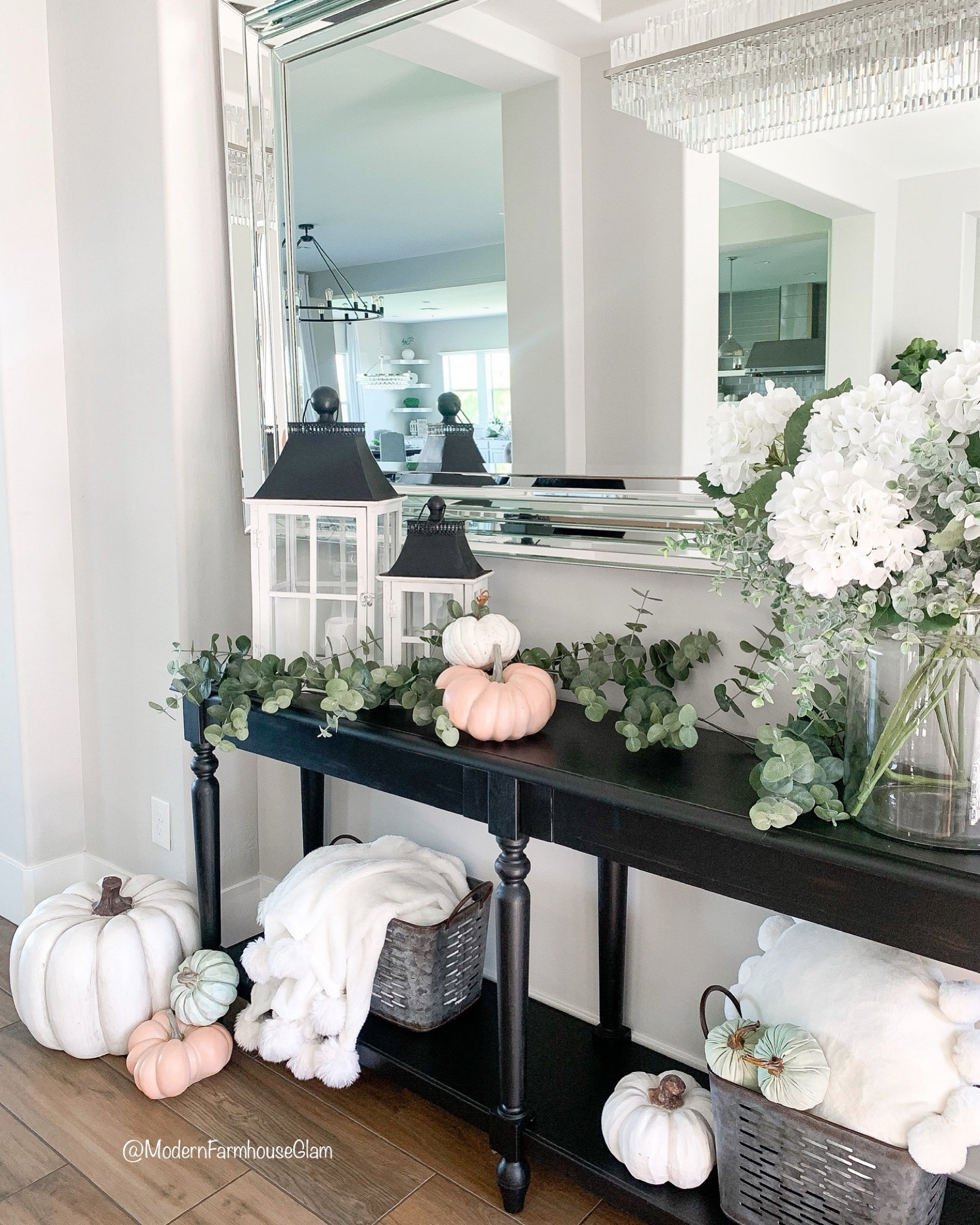 Fall home decor at ModernFarmhouseGlam 
Fall entryway table and fall decorations, Halloween decor. Mirror. Floral stems. Eucalyptus garland. Pumpkins. Pom Pom round throw pillows  white pumpkin  lanterns

#LTKHome