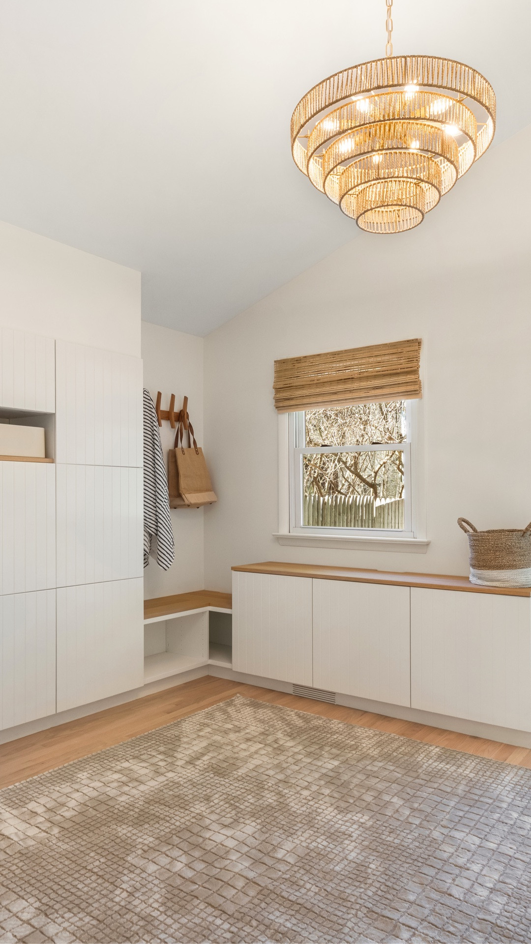 Mudroom and laundry space with layered textures, and a statement chandelier overhead. Added simple storage pieces and warm finishes throughout. Linking exact and similar items below.

#LTKHome #LTKSaleAlert