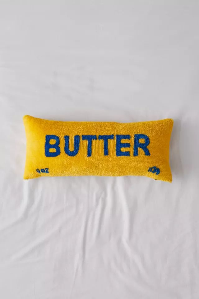 Butter Believe It Shaped Bolster Pillow | Urban Outfitters (US and RoW)