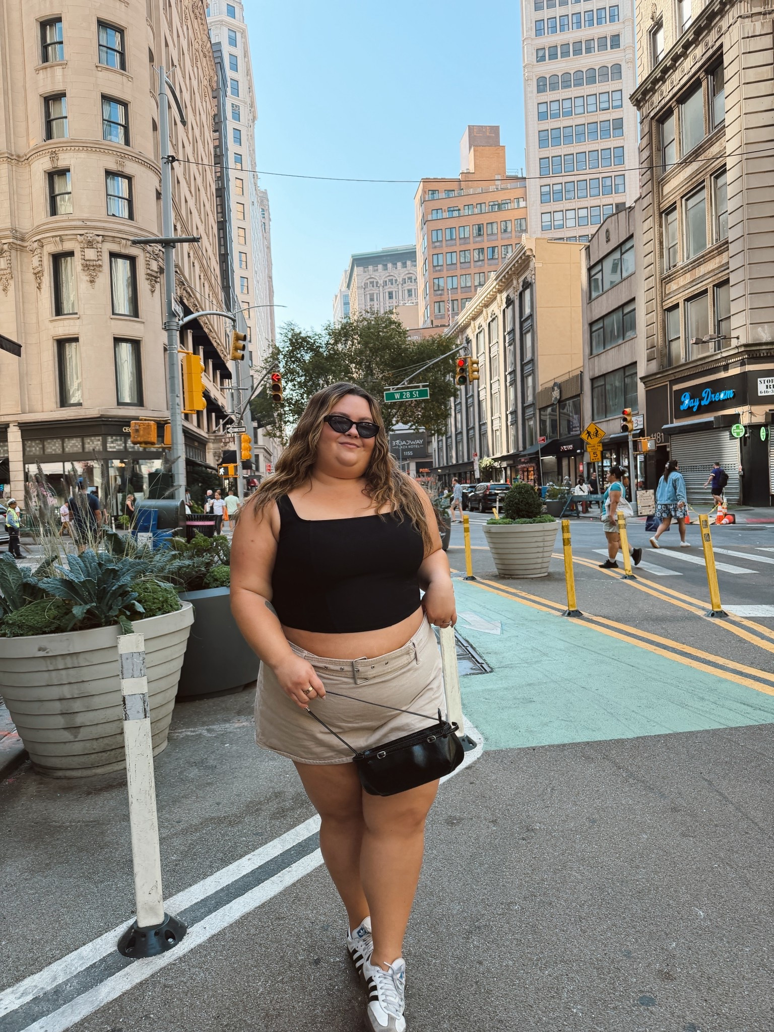 Plus size outfit I wore in New York City as someone who is 5’2 and a size 20! 
- black tank top: (old) Rue 21 size 2X 
- low rise buckle mini skort: Abercrombie size 36
- Adidas Sambas 
- Messy Weekend sunglasses

#LTKPetite #LTKPlusSize #LTKMidsize