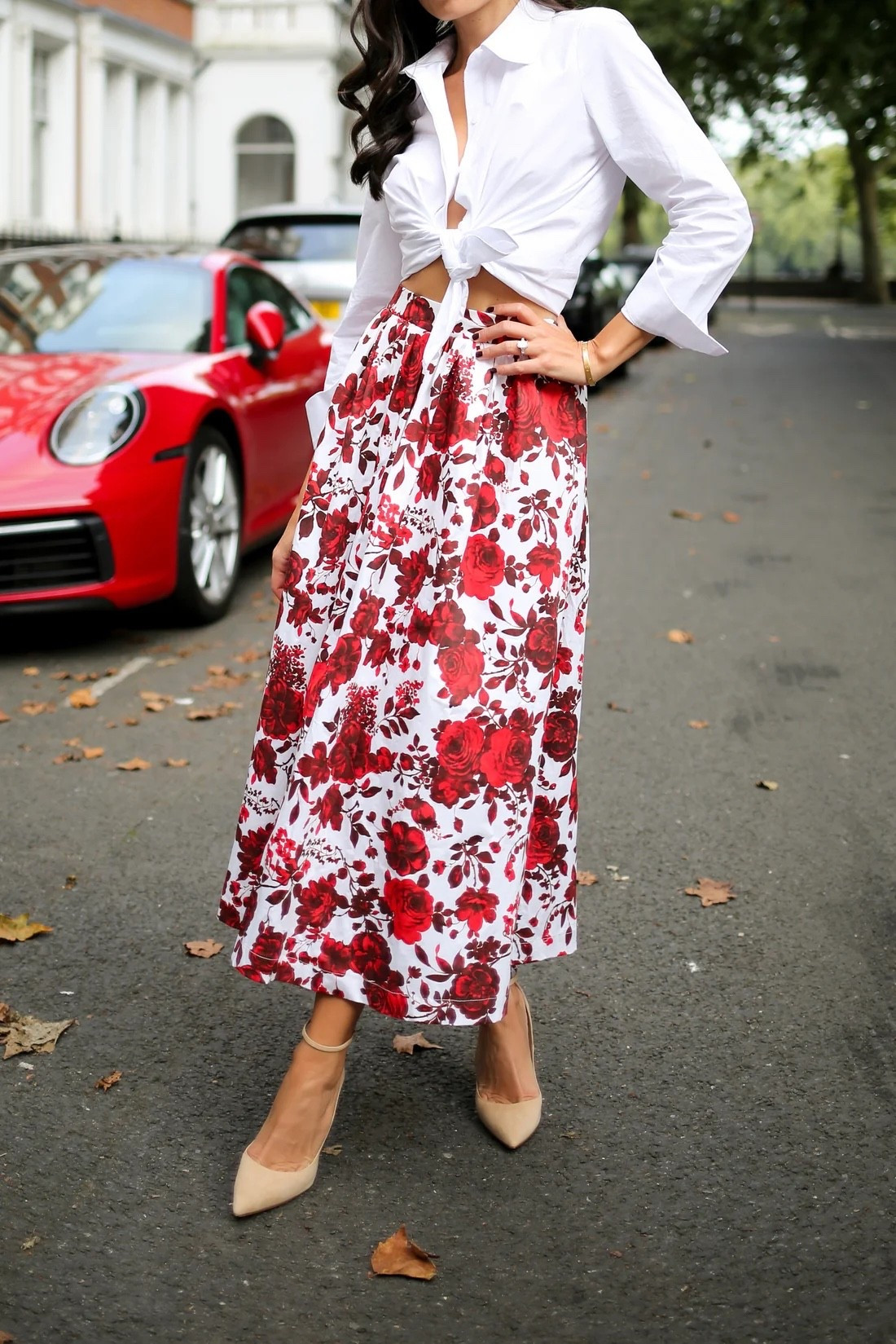 Red floral skirt, classic outfit, cocktail party. Aquazzura shoes, Everyone Loves The Weekend skirt, holiday outfit. 

#LTKShoeCrush #LTKParties #LTKSeasonal