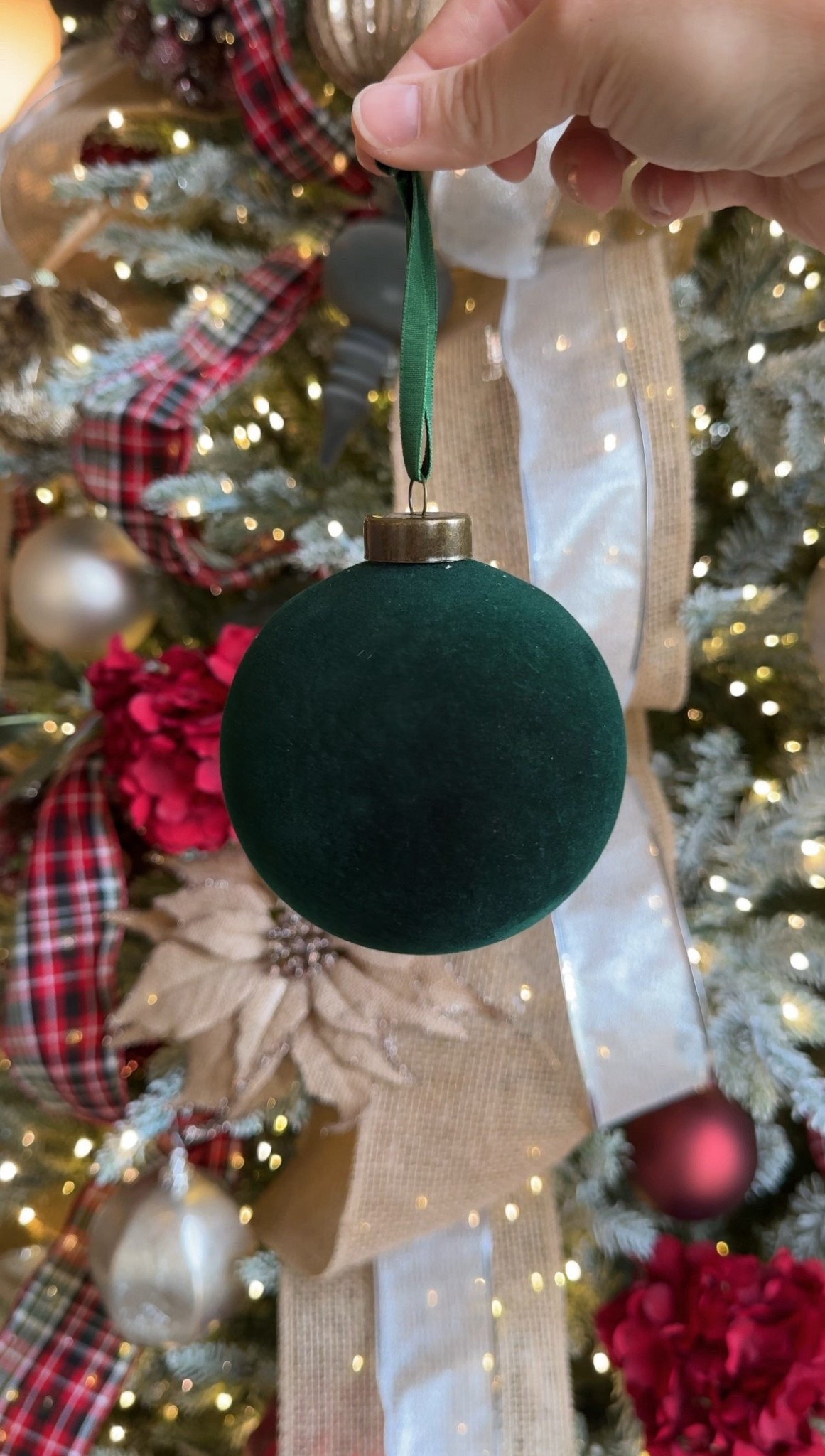 These green velvet ornaments are the perfect shade of evergreen! We used them to decorate our dining room tree 🎄