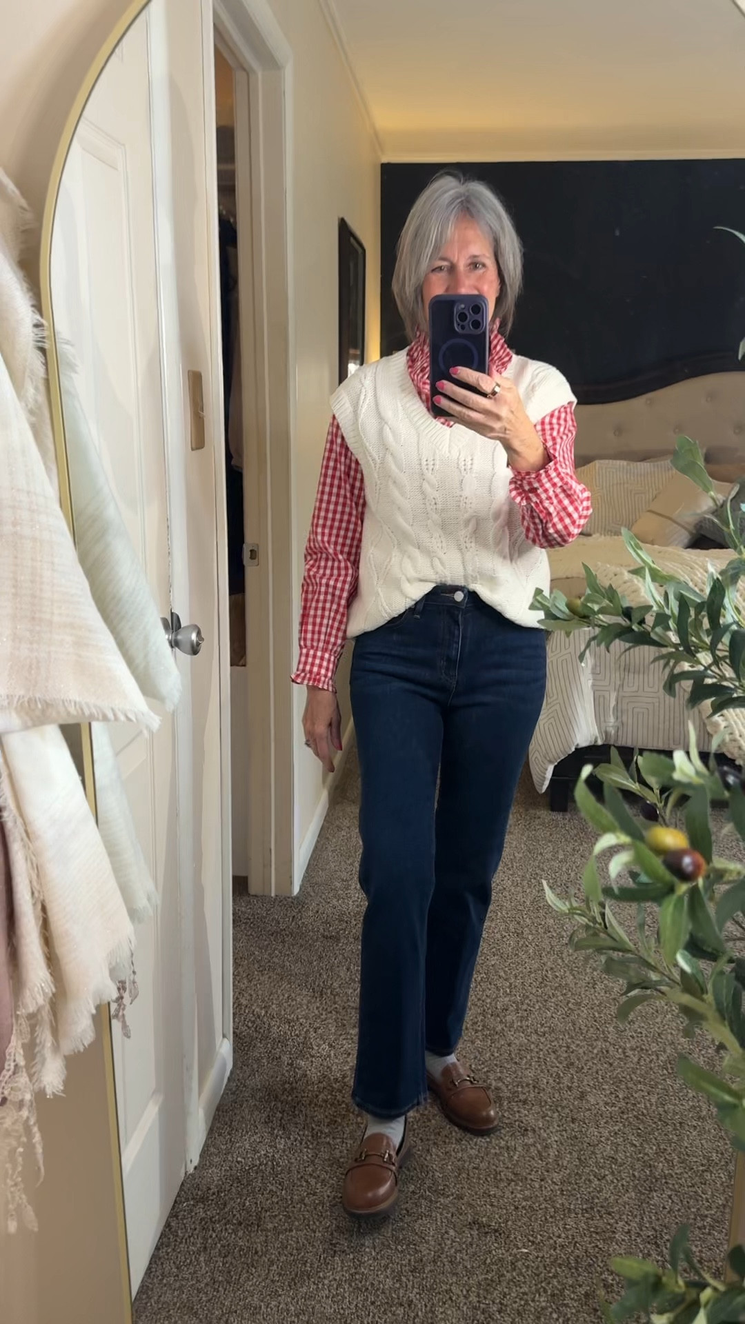 The calendar says spring but outside it’s spitting snow ❄️  I am going with this red gingham shirt and oversized vest because it just makes me happy. 

I am wearing a 26 waist in the jeans which is TTS and a small in the shirt and vest which are both on sale today  