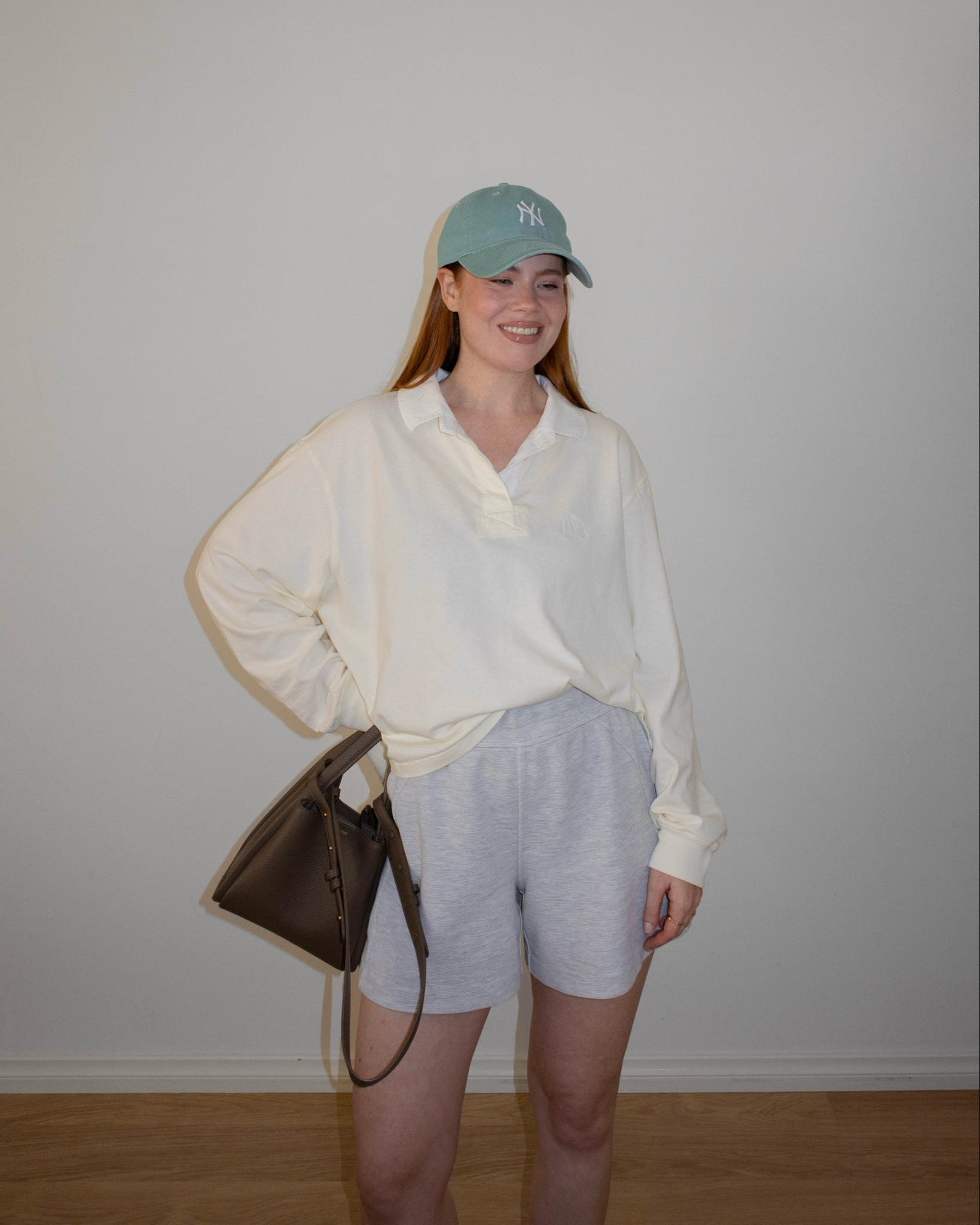 A very casual cool ootd, ft. an oversized rugby polo jumper, a NY cap (such a staple!) and my favourite grey loungewear shorts (mine are sold out, but I linked a very similar lululemon pair below).

#LTKaustralia #LTKsummer