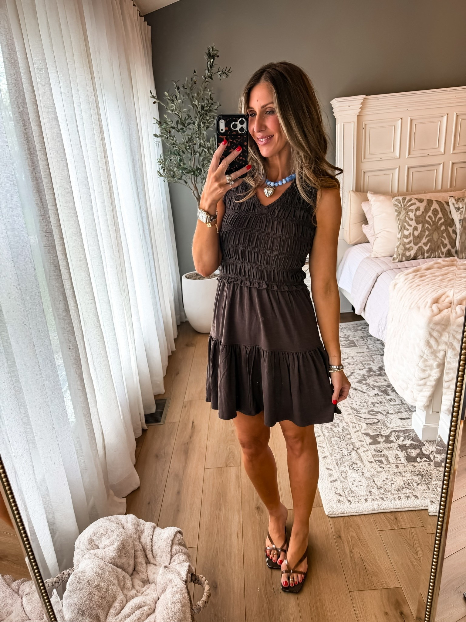 this little brown dress is such a good staple for summer. the smocked detail is super flattering, lightweight for the heat, and easy to dress up with sandals and jewelry or keep casual for everyday wear

brown mini dress, smocked dress, summer outfit ideas, casual summer dress, vacation outfit, date night look, everyday fashion, neutral style, affordable dresses, chic summer style, themominstyle

#LTKootd #LTKSeasonal #LTKOver40