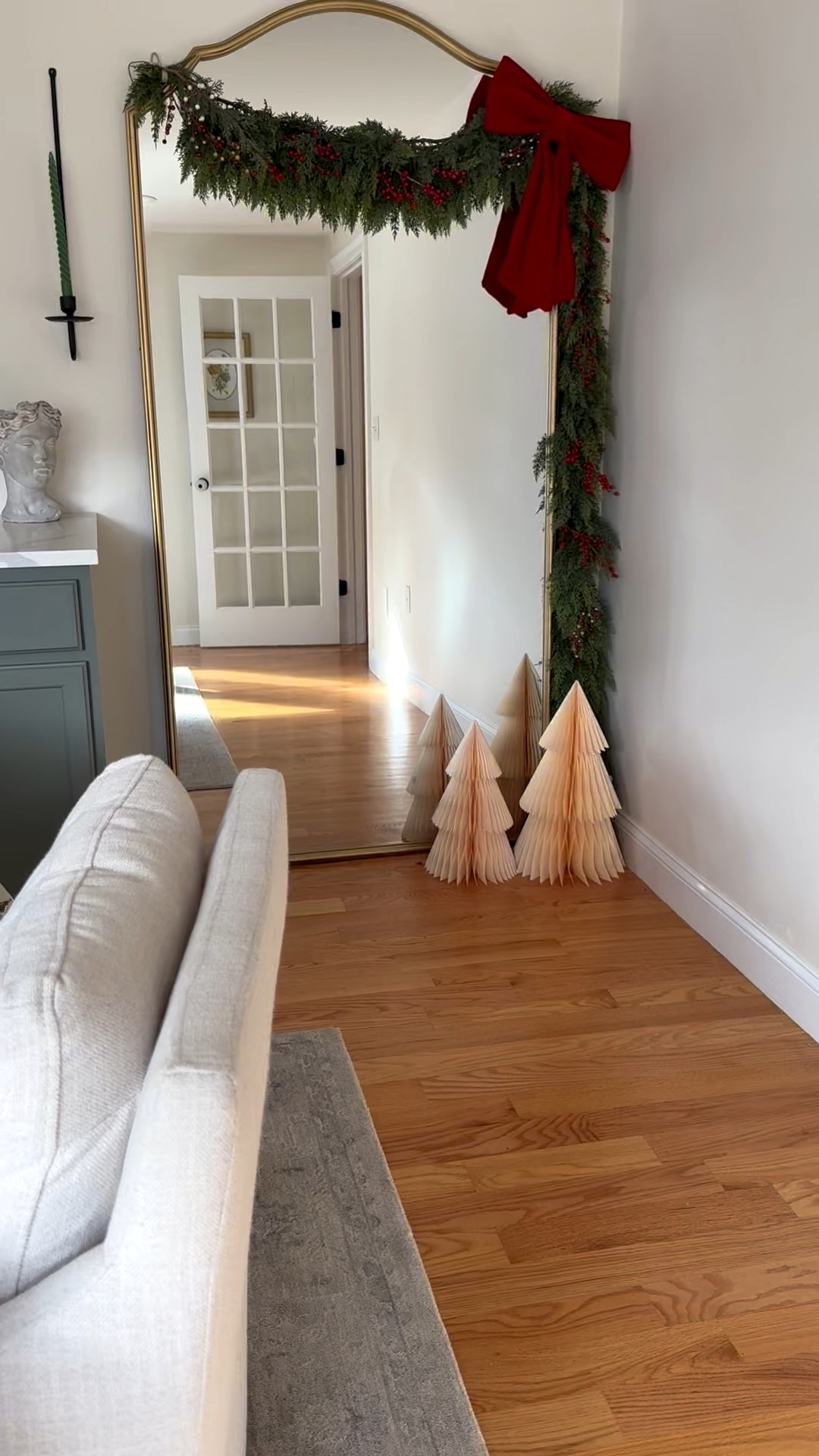 Love my floor mirror decorated for Christmas! 

#LTKHome #LTKHoliday