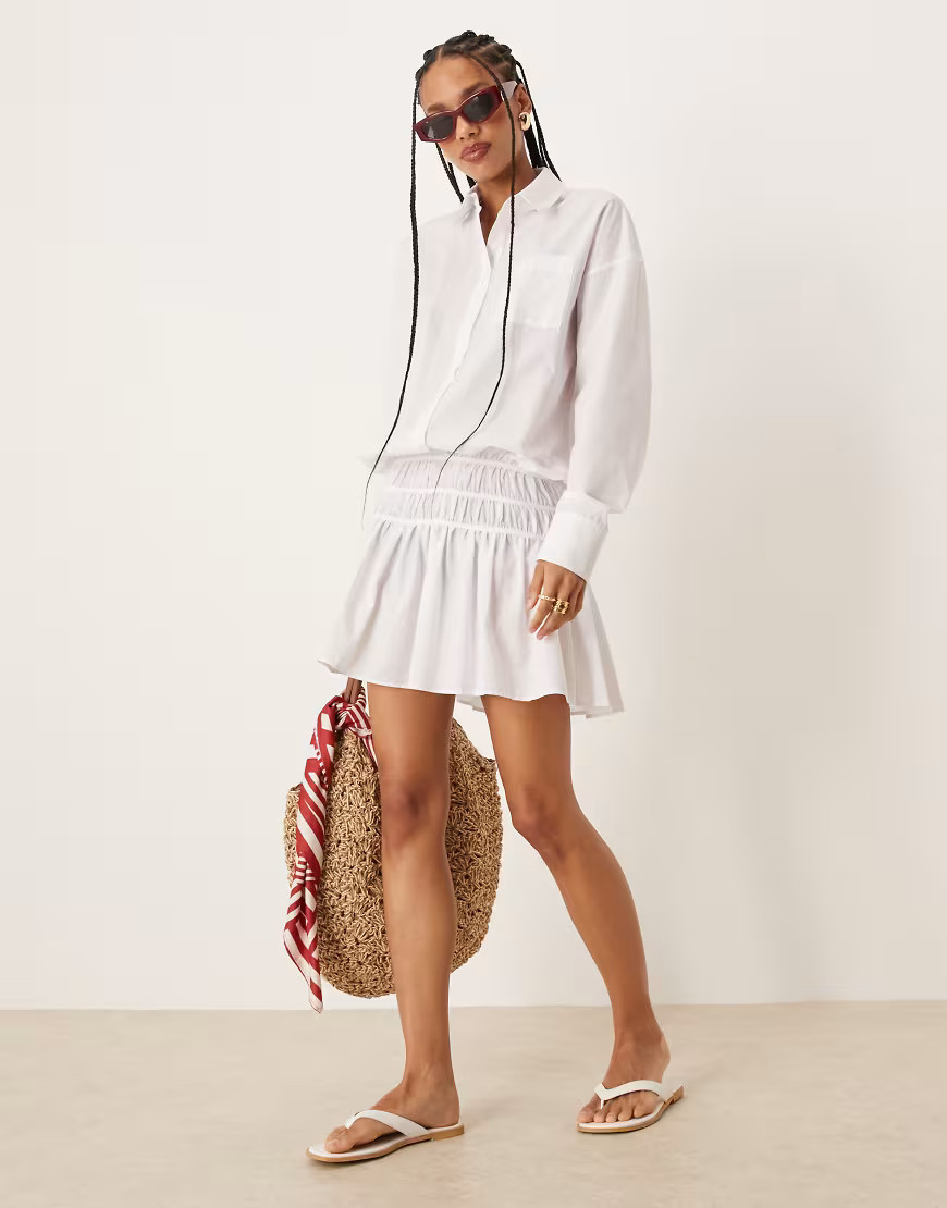 ASOS DESIGN – Kurzes Blouson-Hemdkleid in Weiß mit tief angesetzter Taille | ASOS (Global)