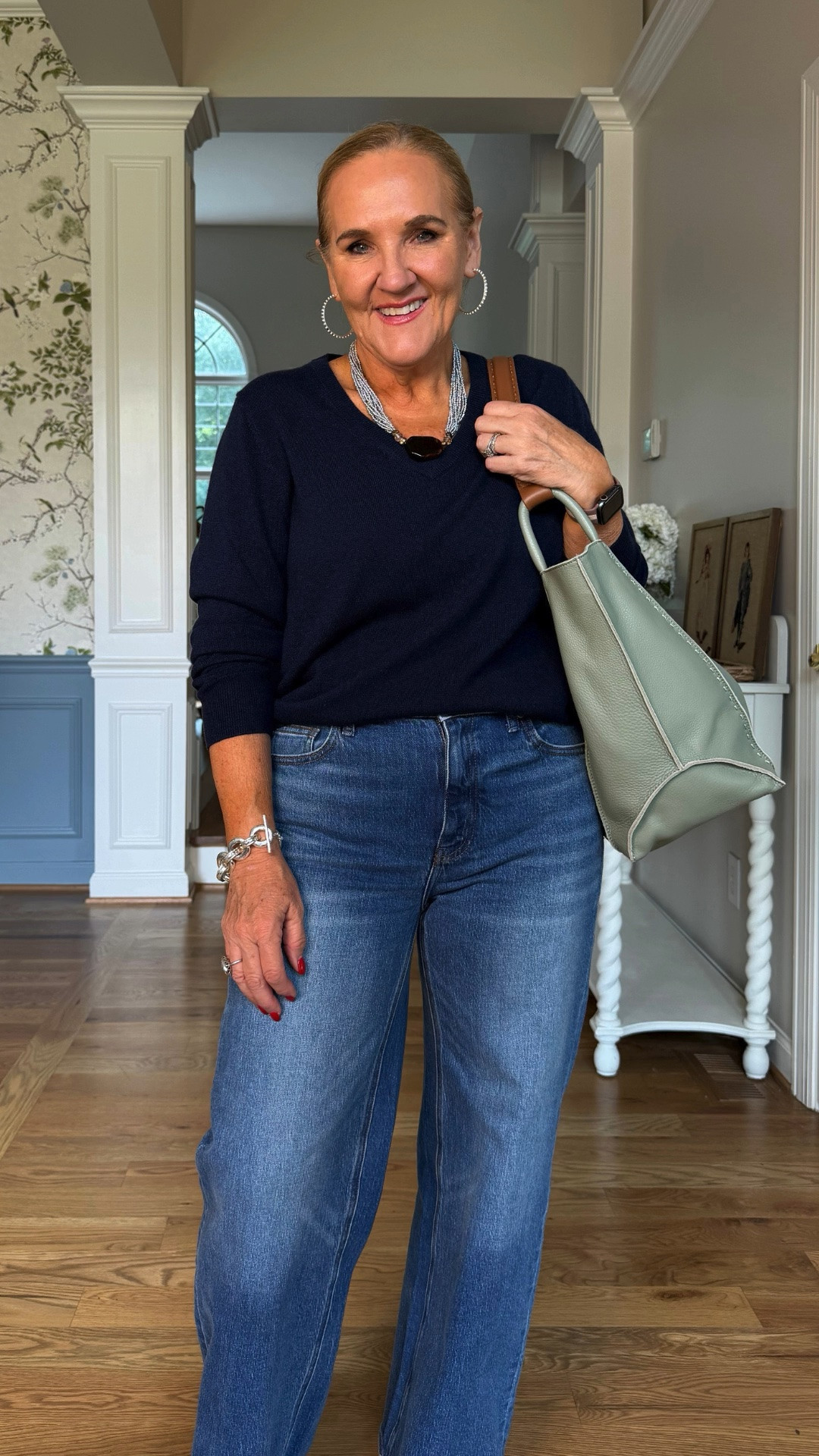 This navy sweater and classic straight-leg jeans are an effortless everyday combination. The soft green tote adds a fresh pop of color while keeping the look polished and practical.

💡 LTK MADE EASY
❤️ Heart = Support my posts!
🔖 Save = Get sale & restock alerts
📋 Lists = Keep favorites organized
📲 Share = Send lists and products to a friend. Hello, Christmas List!
💬 Comment = Ask me anything about what I'm wearing.:-)

#LTKootd #LTKWorkwear #LTKOver40