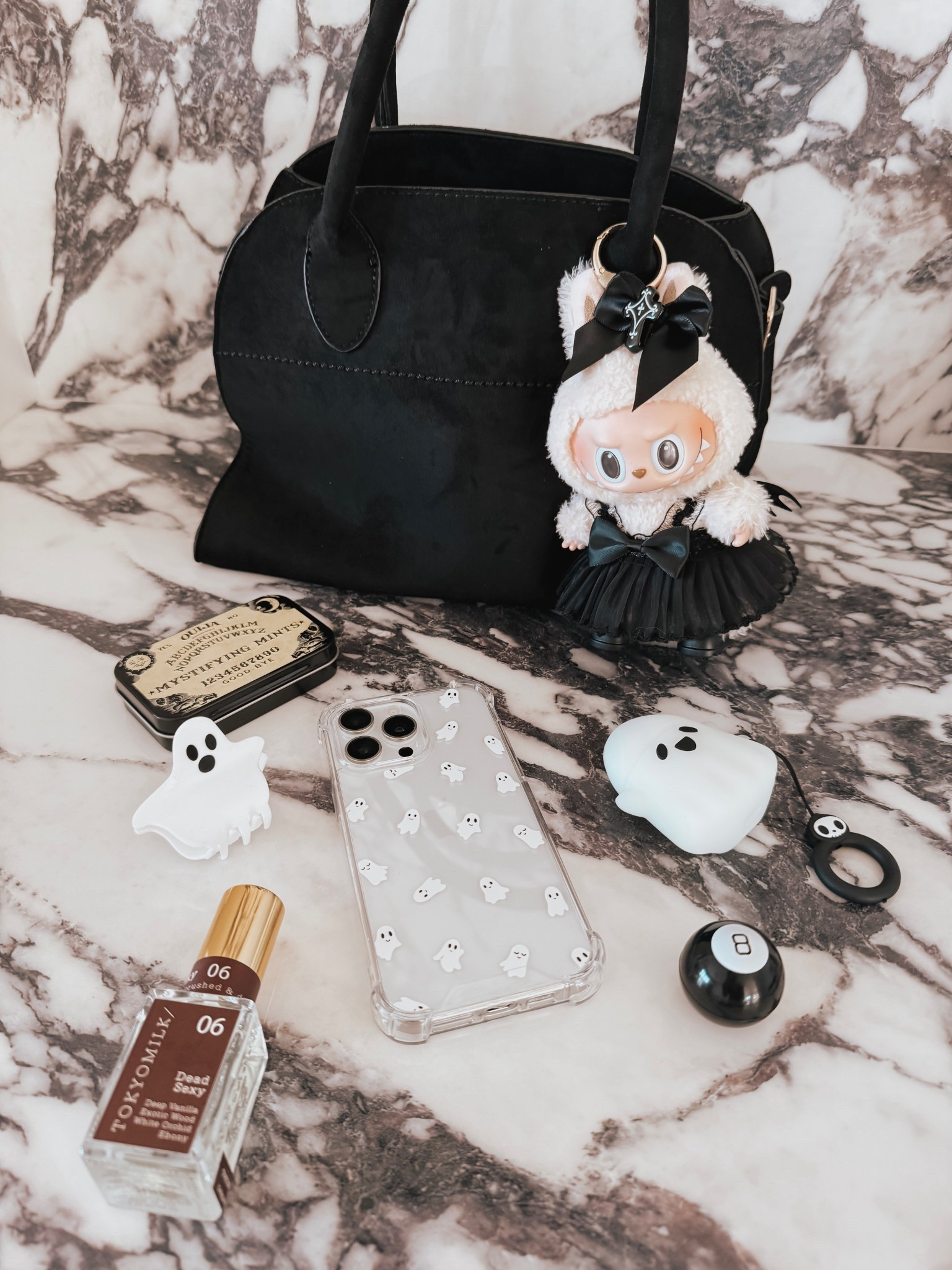 Spooky season purse essentials! Loving all the ghost and ghoul accessories

#LTKStyleTip