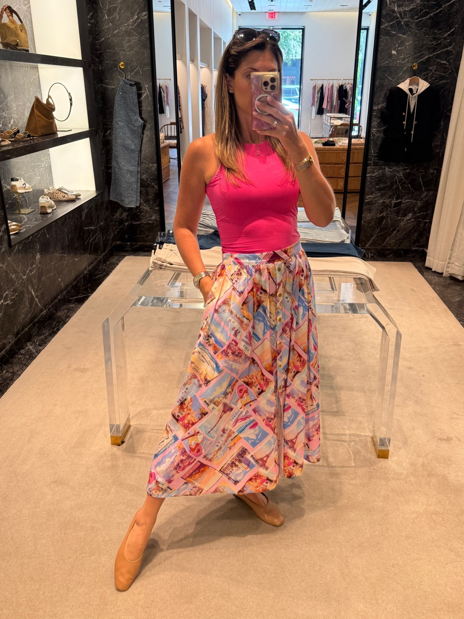 This vibrant printed skirt is perfect for summer. Pairs beautifully with a solid white, pink or blue cropped top. Love the midi length, gold buttons and pockets. Comfortable yet chic, and now on sale! Runs TTS.

#LTKootd #LTKSaleAlert #LTKOver40