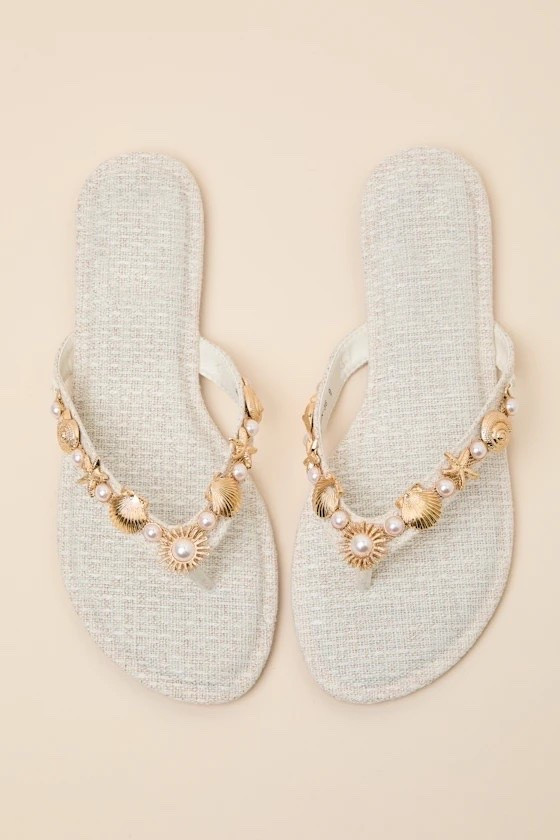 Off to the beach? These sandals are easy to wear, easy to style, and brings a soft, elevated feel to everyday summer looks. Under $30.

Keywords:

* seashell sandals
* pearl sandals
* thong sandals
* beige sandals
* summer sandals
* beach sandals
* flat sandals
* vacation sandals
* beach outfit
* vacation outfit
* resort wear
* summer outfit ideas
* poolside outfit
* travel outfit
* warm weather outfit
* casual summer style
* coastal chic
* beachy aesthetic
* european summer style
* seaside style
* soft feminine aesthetic
* relaxed luxury
* resort aesthetic
* effortless summer look

#LTKgrwm #LTKTravel #LTKSwim
