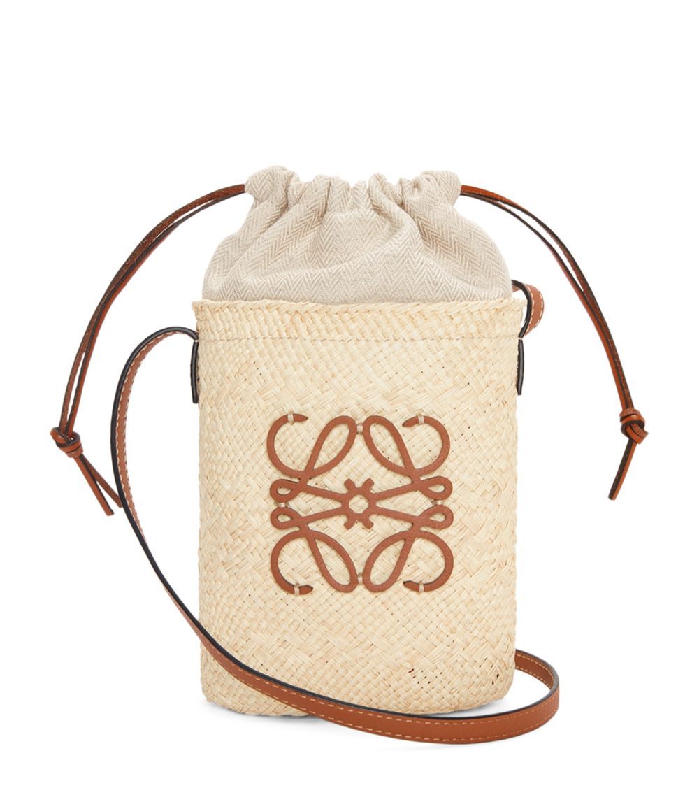 x Paula’s Ibiza Straw Bucket Bag | Harrods