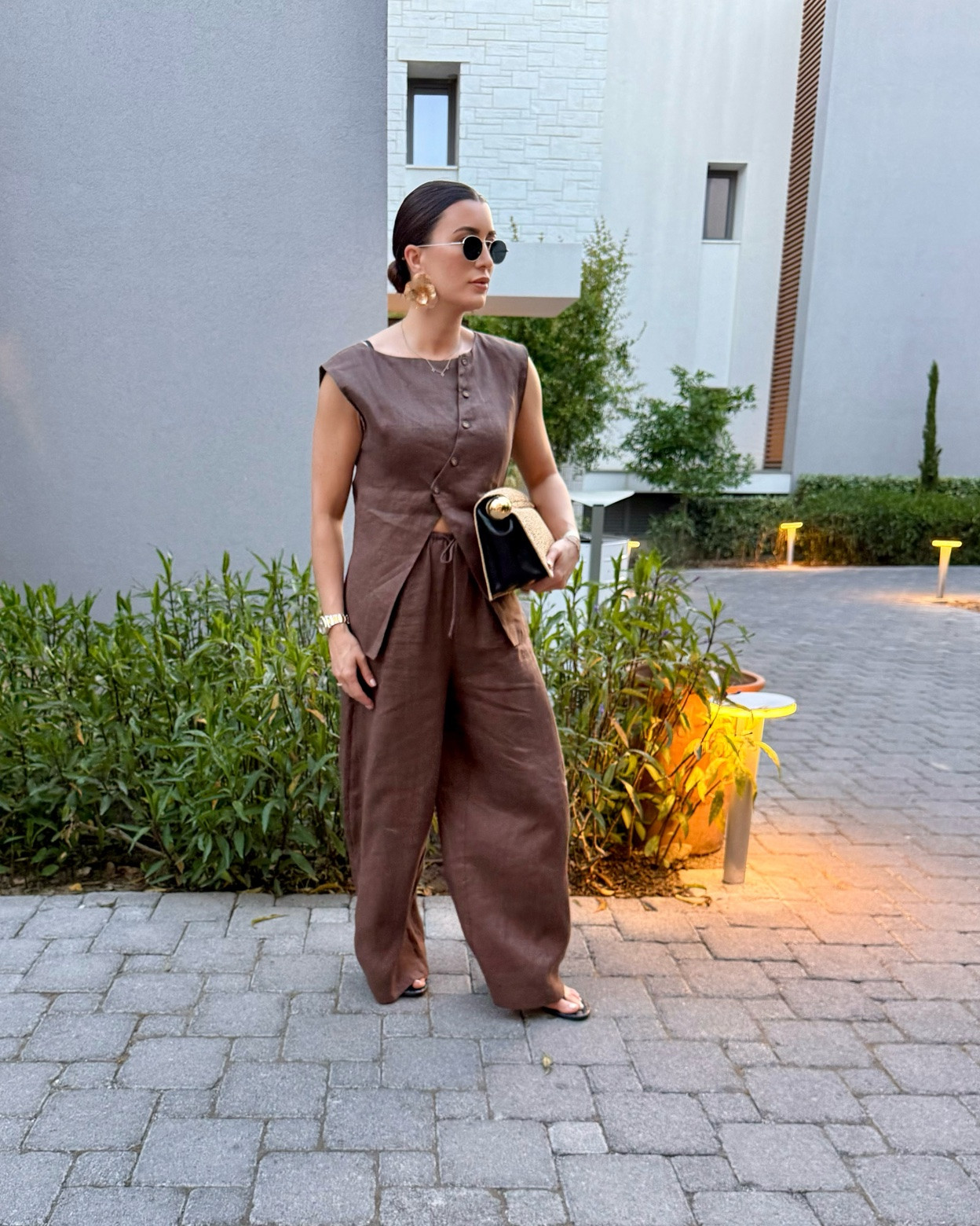 I always reach for trousers on the first night knowing I’ll still have pale legs. 
I picked up this brown linen co-ord from @asos it’s an Australian brand called @vrg.grl

#LTKsummer #LTKeurope #LTKstyletip