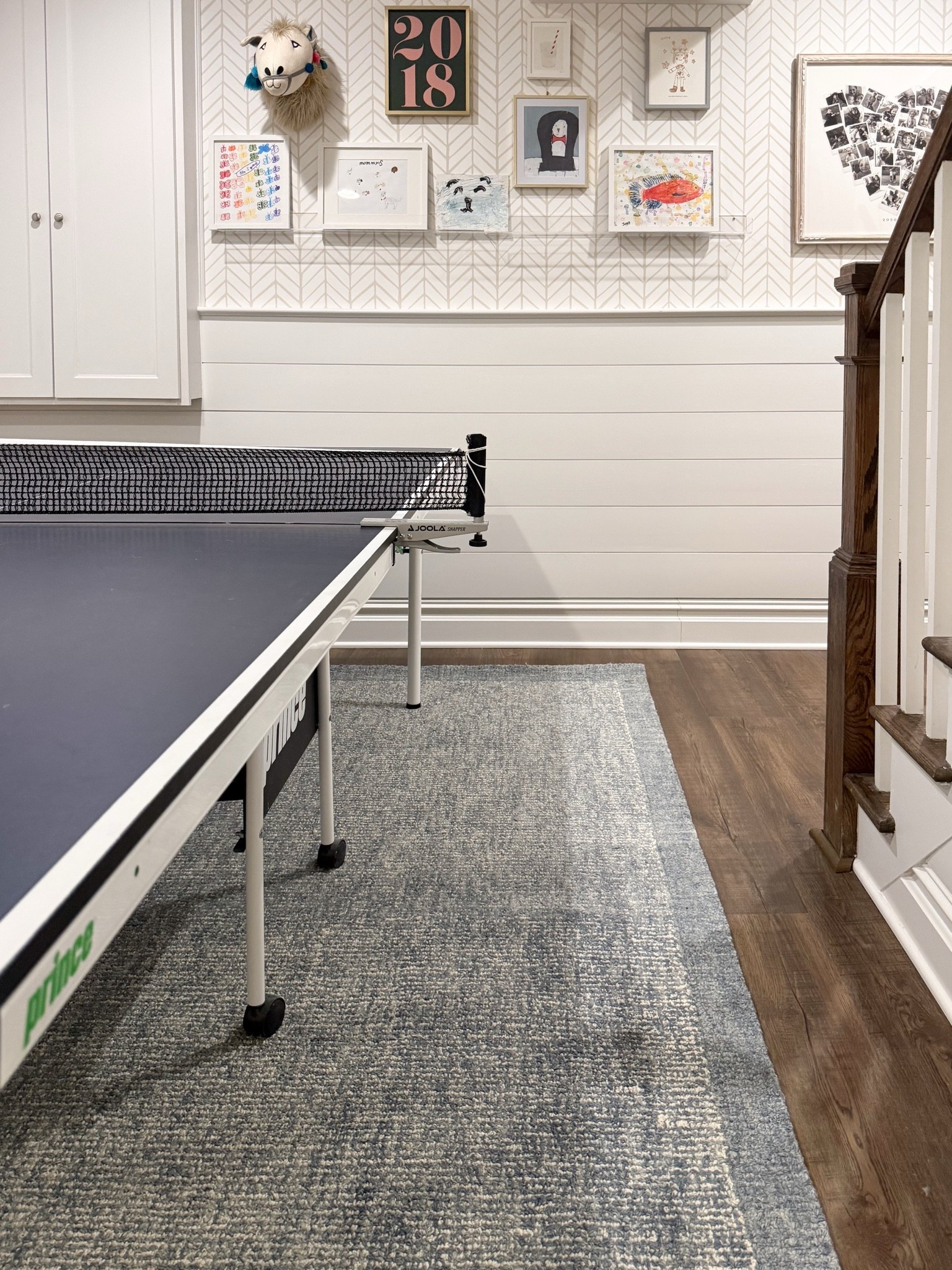This rug is a great example of how even a high traffic space can feel warm and inviting. I love the rich blue tones and subtle texture, which add depth without overpowering the room. It's durable enough to handle everything from ping pong tournaments to everyday foot traffic while bringing softness and color to the space.
Basement rug, game room rug, blue area rug, family room rug, durable area rug, high traffic rug, neutral home décor, textured rug, Loloi rug, basement décor, GirlOnTheHudson

#LTKmomlife #LTKHome #LTKActive
