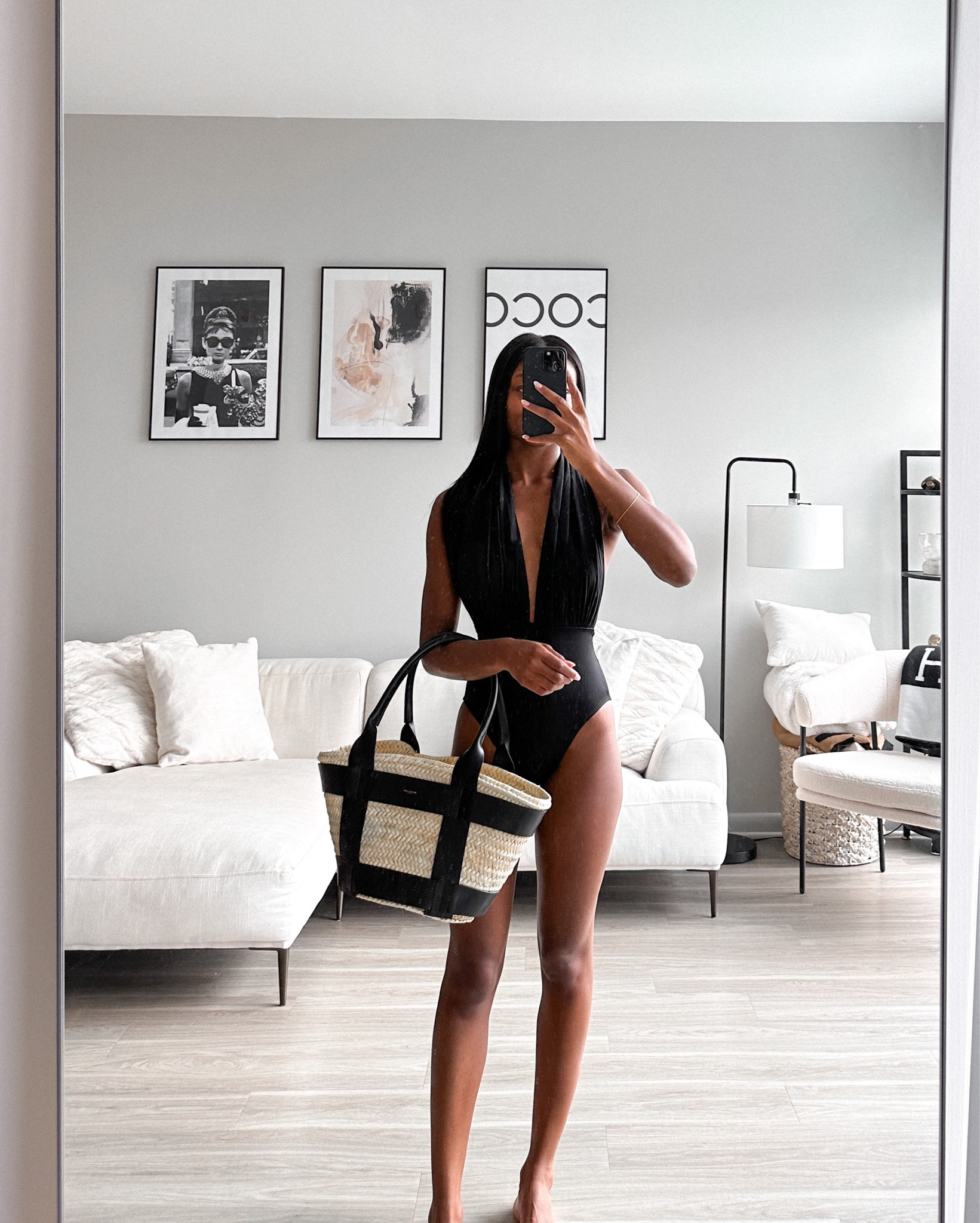 My black Norma Kamali one piece swimsuit is back in stock! I am wearing a size small! I love the halter neck on this. It also gives great coverage. I styled it with my black straw DeMellier tote! 

#LTKSeasonal #LTKitbag #LTKswim