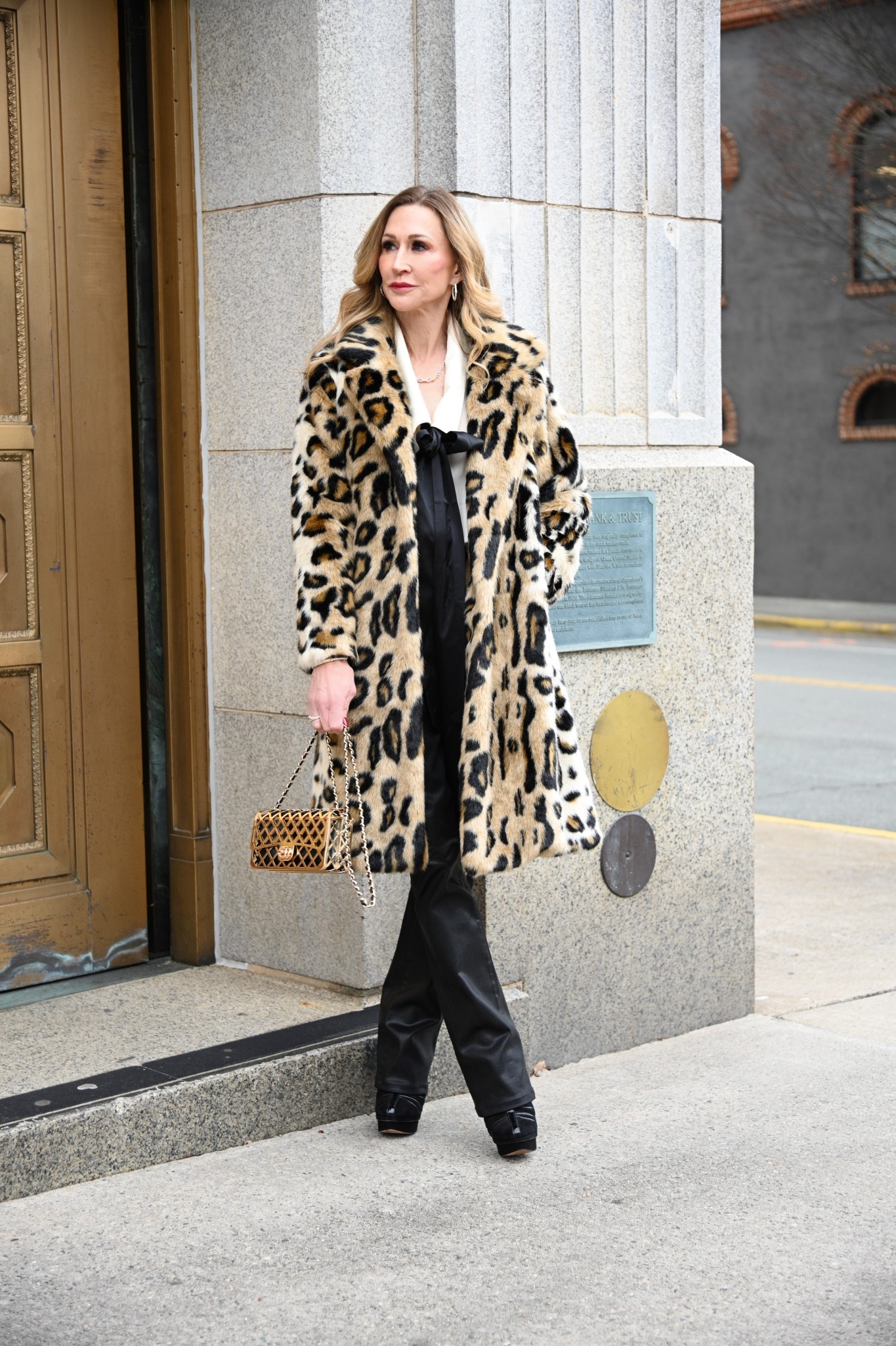 A chic winter outfit featuring a leopard fur coat from MME Mink, black coated jeans from L’Agence, a white blouse with a black bow from Tuckernuck and fabulous accessories!  


#LTKSeasonal #LTKootd #LTKHoliday