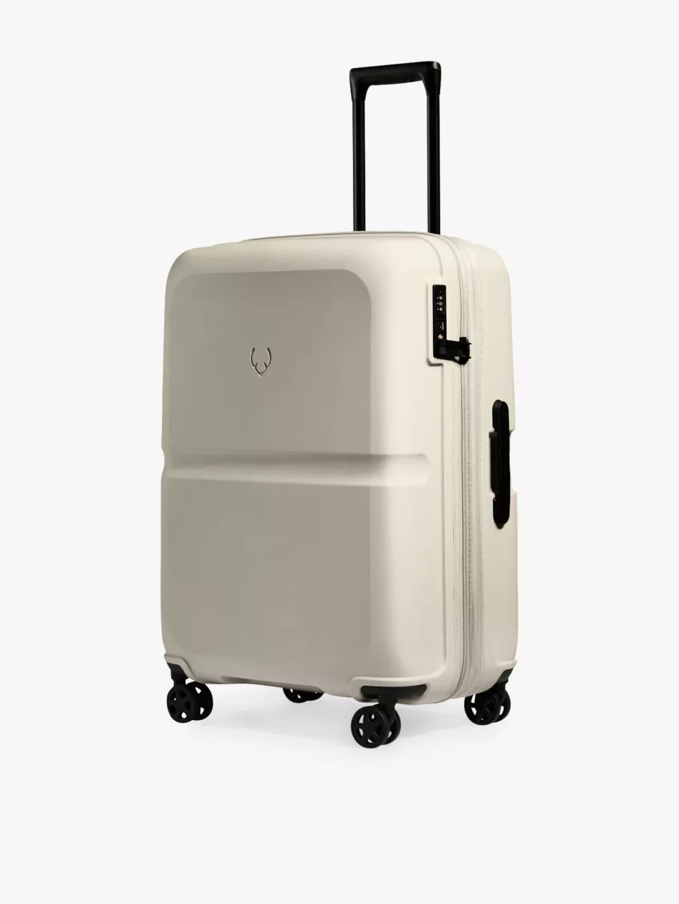 Single Stripe shell four-wheeled cabin suitcase 55cm | Selfridges