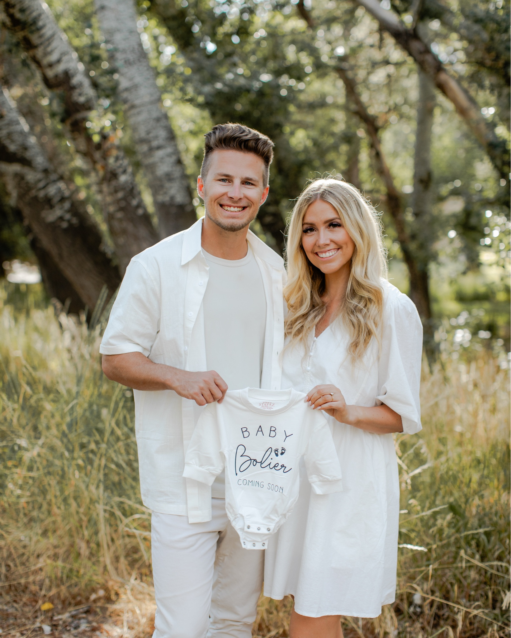 pregnancy announcement photoshoot outfits 🤍 loved this custom baby romper sweatshirt!

 photo credit: @tianaflakephoto

| pregnancy announcement photos | bump friendly outfit | mens outfit | couples outfits | family photos 

#LTKFindsUnder100 #LTKBump