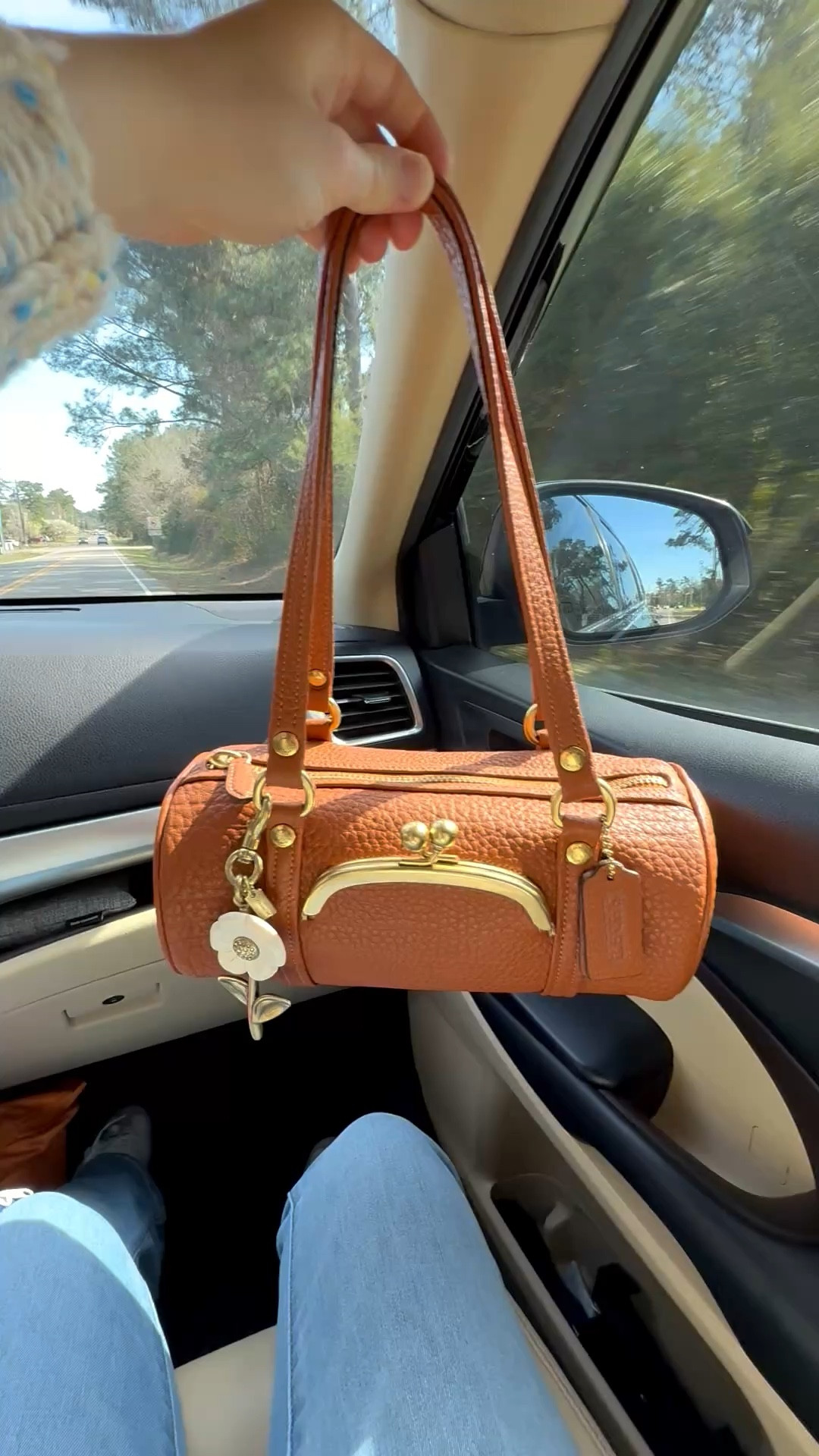 Favorite Coach bag at the moment 😍 I love this little Coach Kisslock Barrel Bag ! Perfect size and the color is great for year round use. Added the daisy bag charm for a cute spring look  . Hurry and go grab this amber brown battle bag while it’s in stock! 🏃‍♀️ 

Coach Kisslock barrel amber brown 

#LTKmomlife #LTKootd #LTKSeasonal